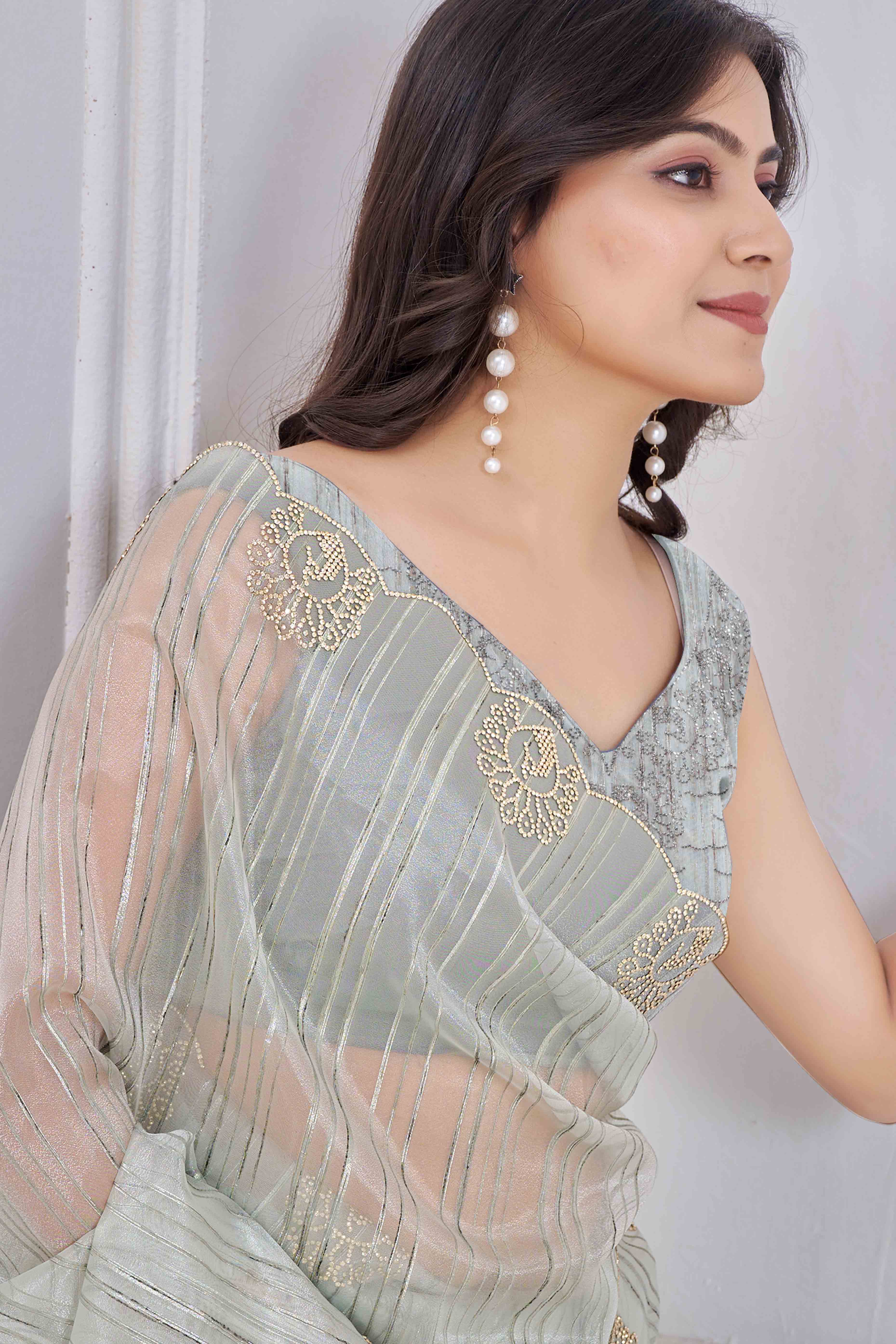Green Cotton Blend Saree with Modern Stripes and Delicate Stone Embroidery