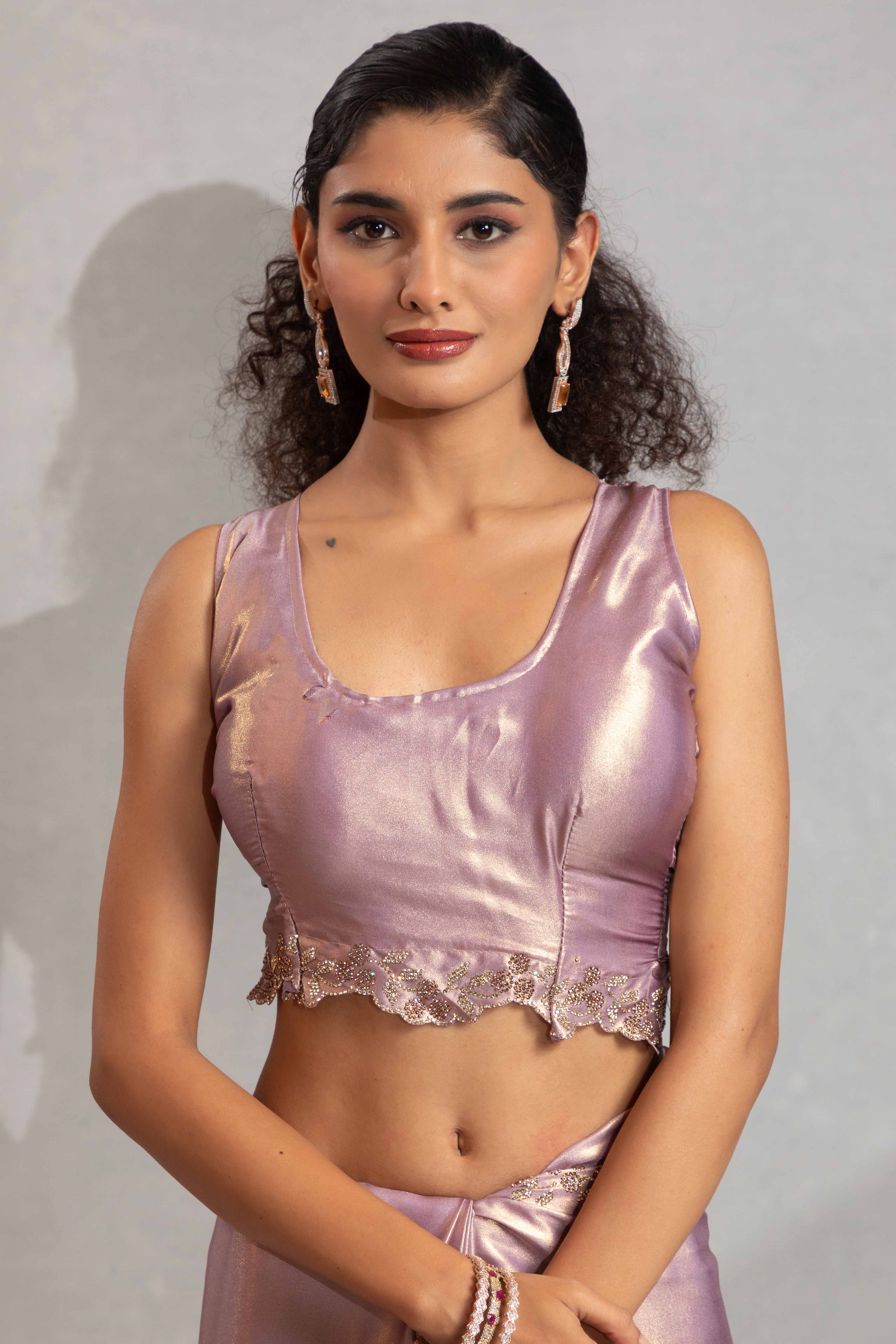 Lavender Satin Georgette Saree Adorned With Subtle Foil Finish & A Sparkling Zarkan Work Border