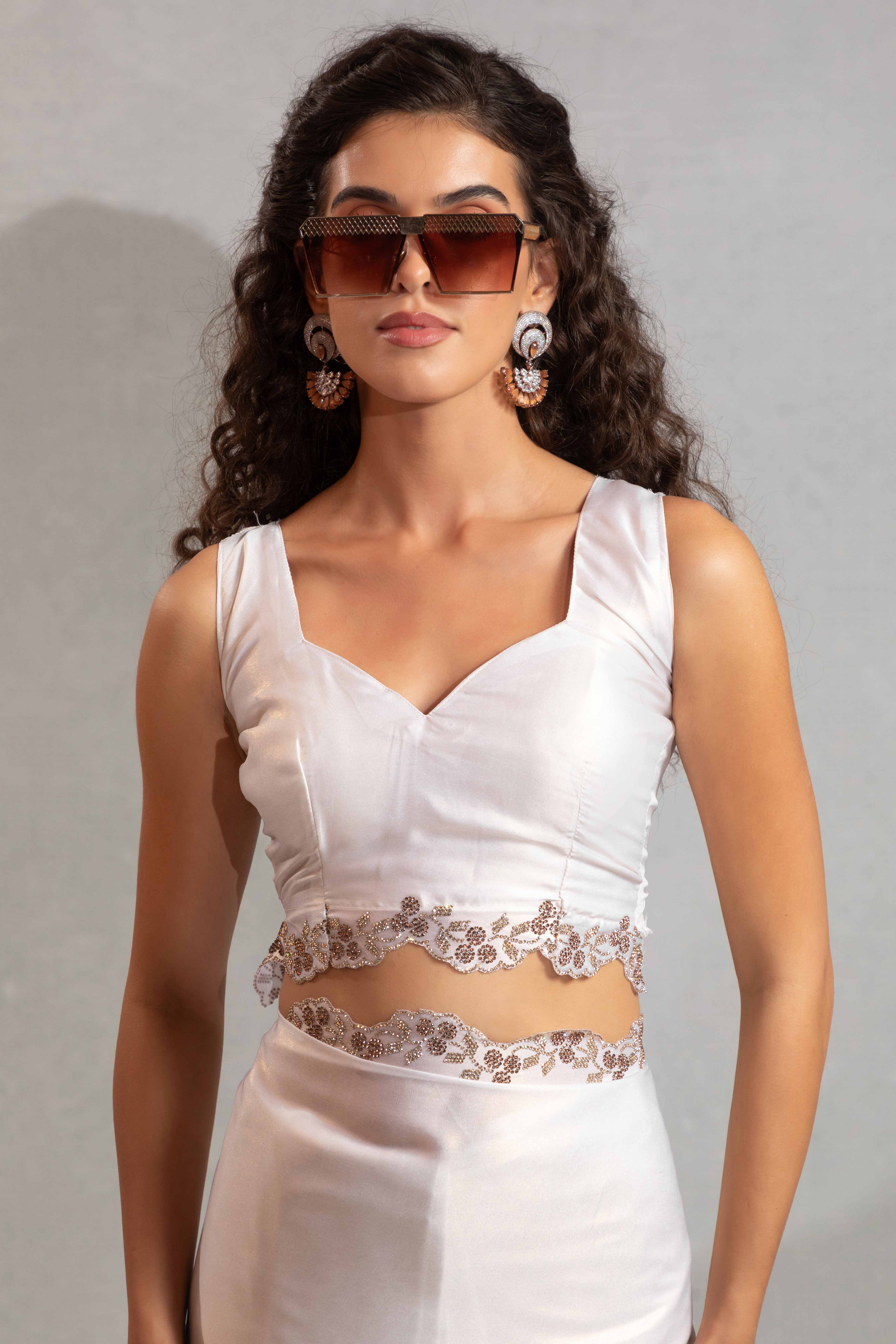 White Satin Georgette Saree Adorned With Subtle Foil Finish & A Sparkling Zarkan Work Border