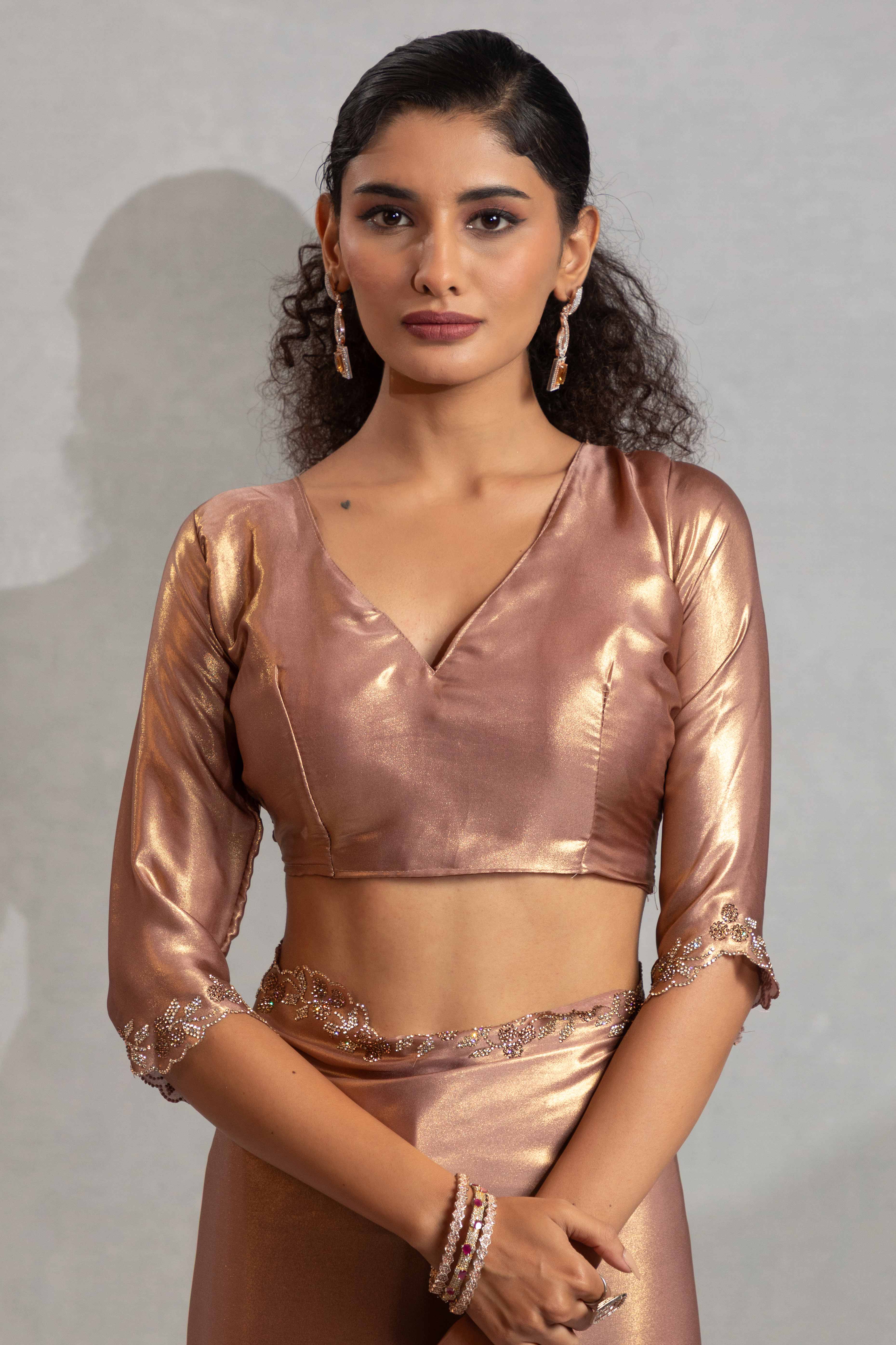 Zircon Brown Satin Georgette Saree Adorned With Subtle Foil Finish & A Sparkling Zarkan Work Border