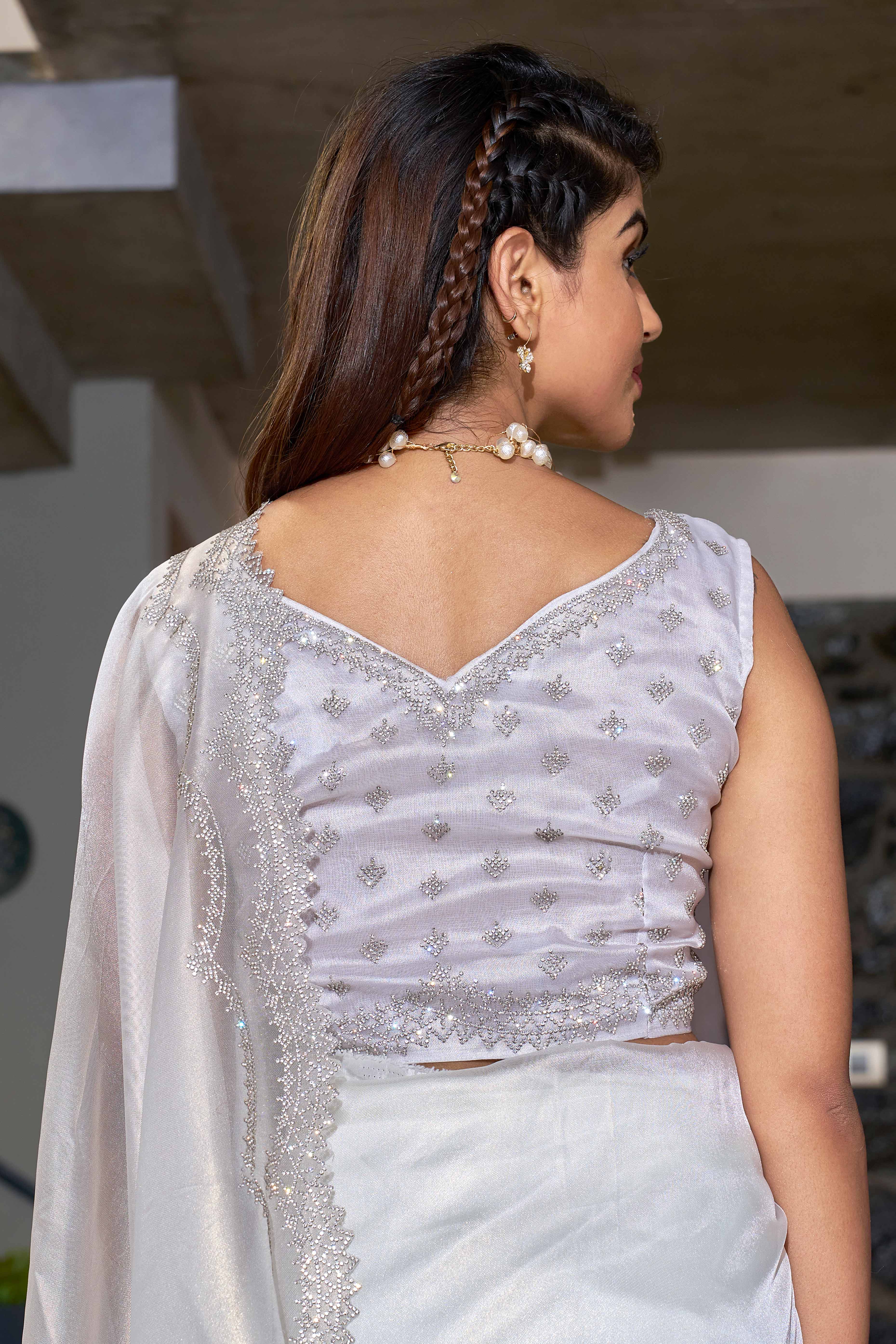 Charming  White Organza Solid Saree With Delicate Embellishments