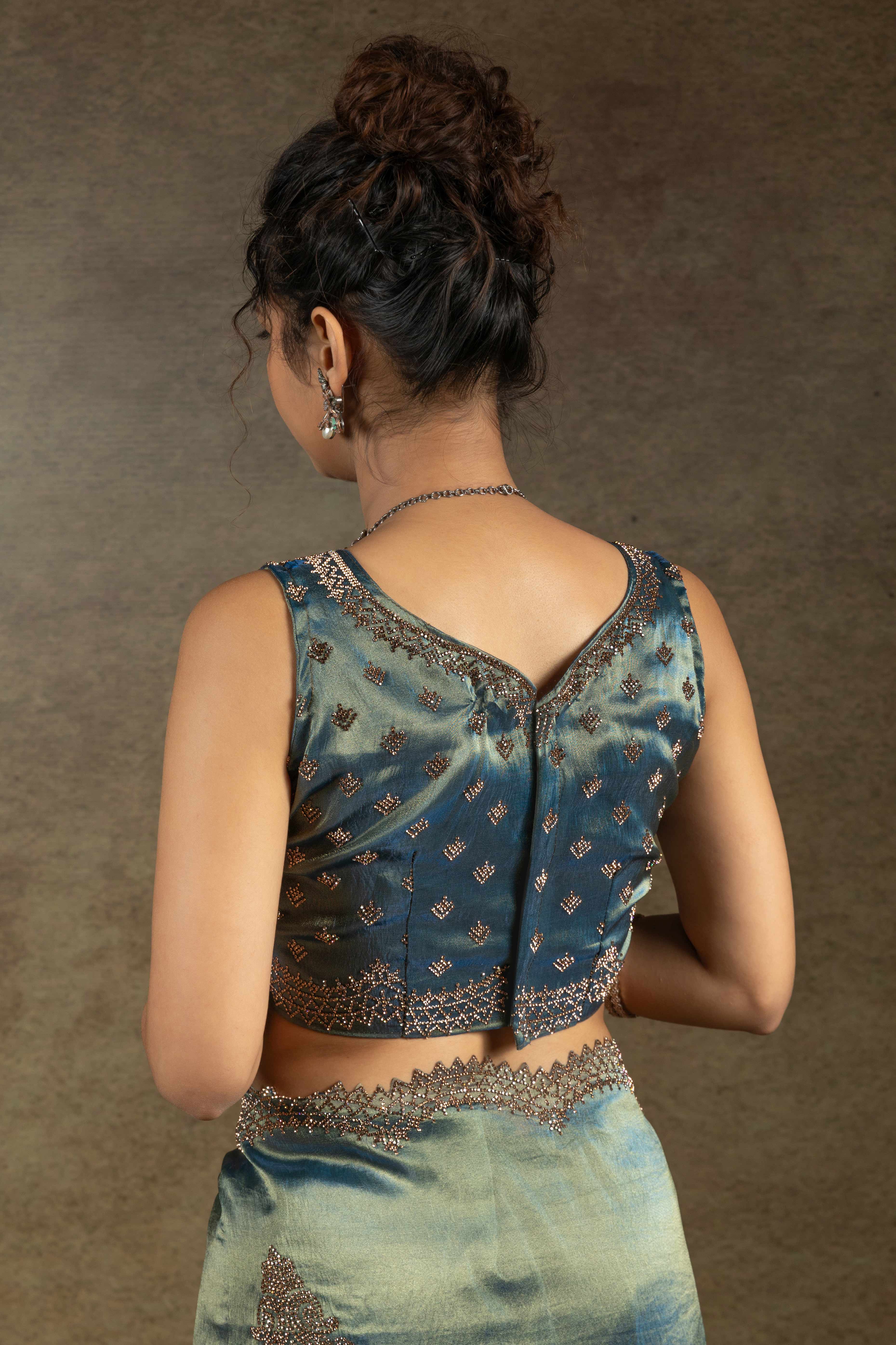 Teal Banarasi Silk Saree with Stone Embellishments Perfect for Party Wear