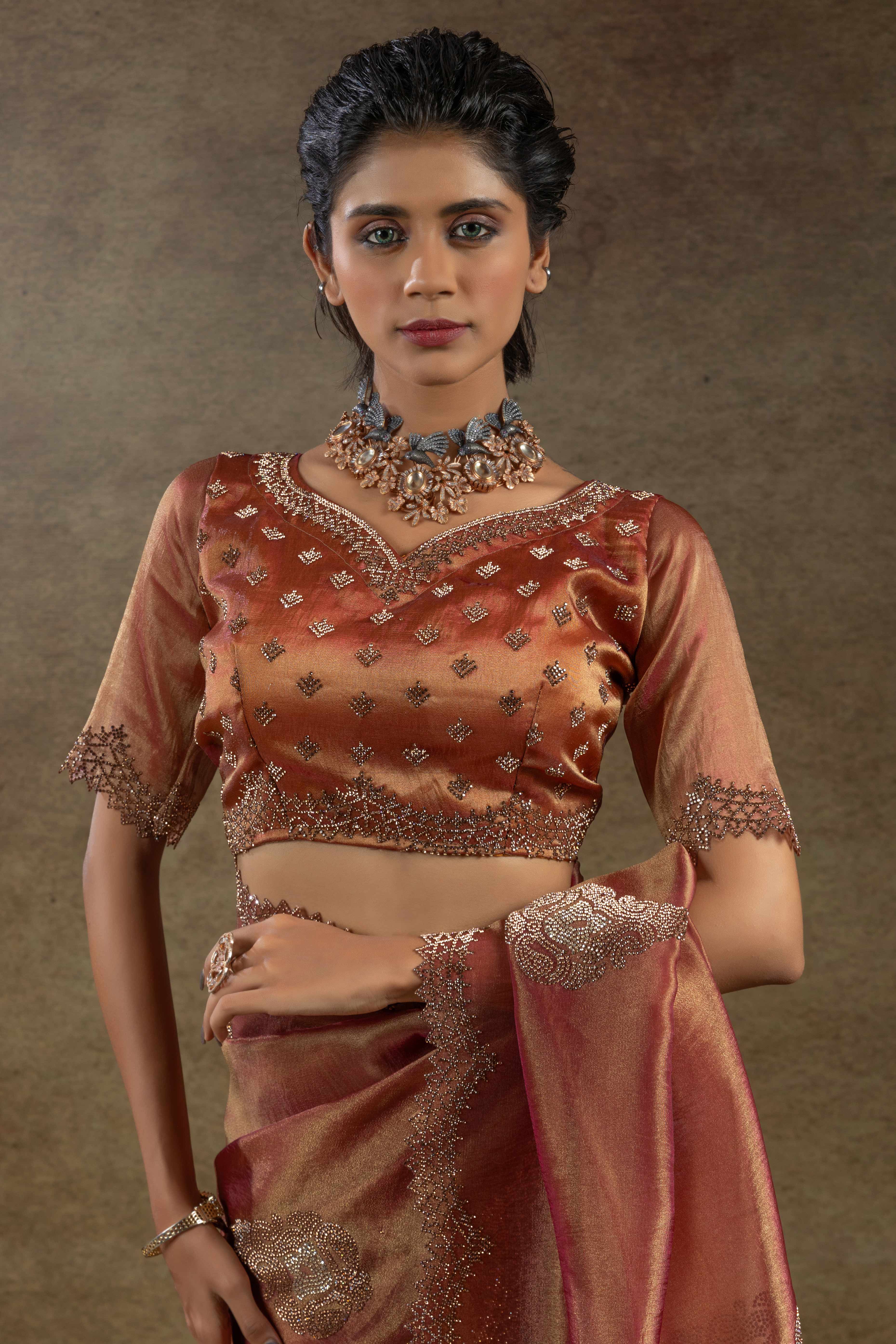 Peach Banarasi Silk Saree with Stone Embellishments Perfect for Party Wear