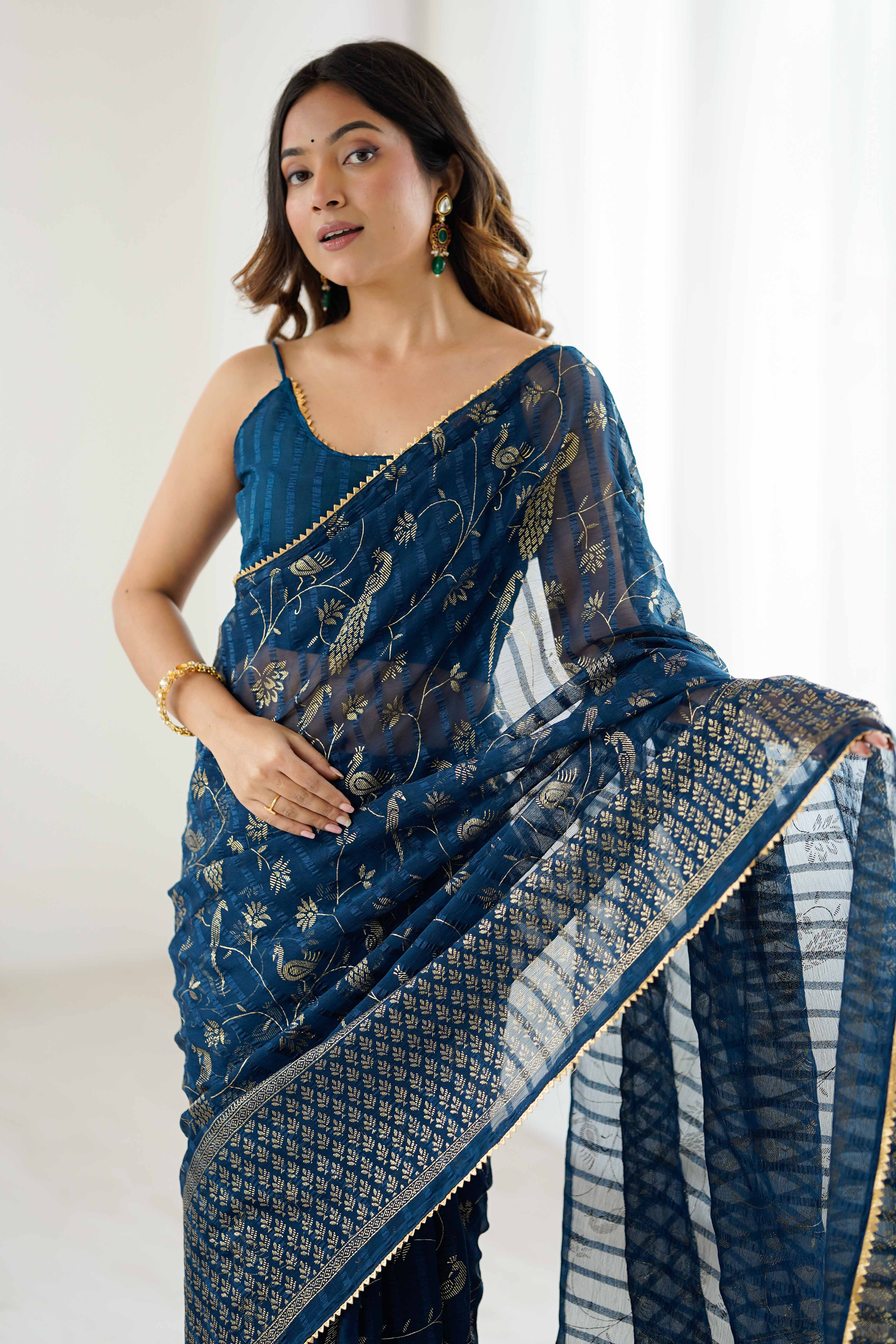 Morpich Blue Georgette Saree with Shimmering Foil Print & Gota Patti Border
