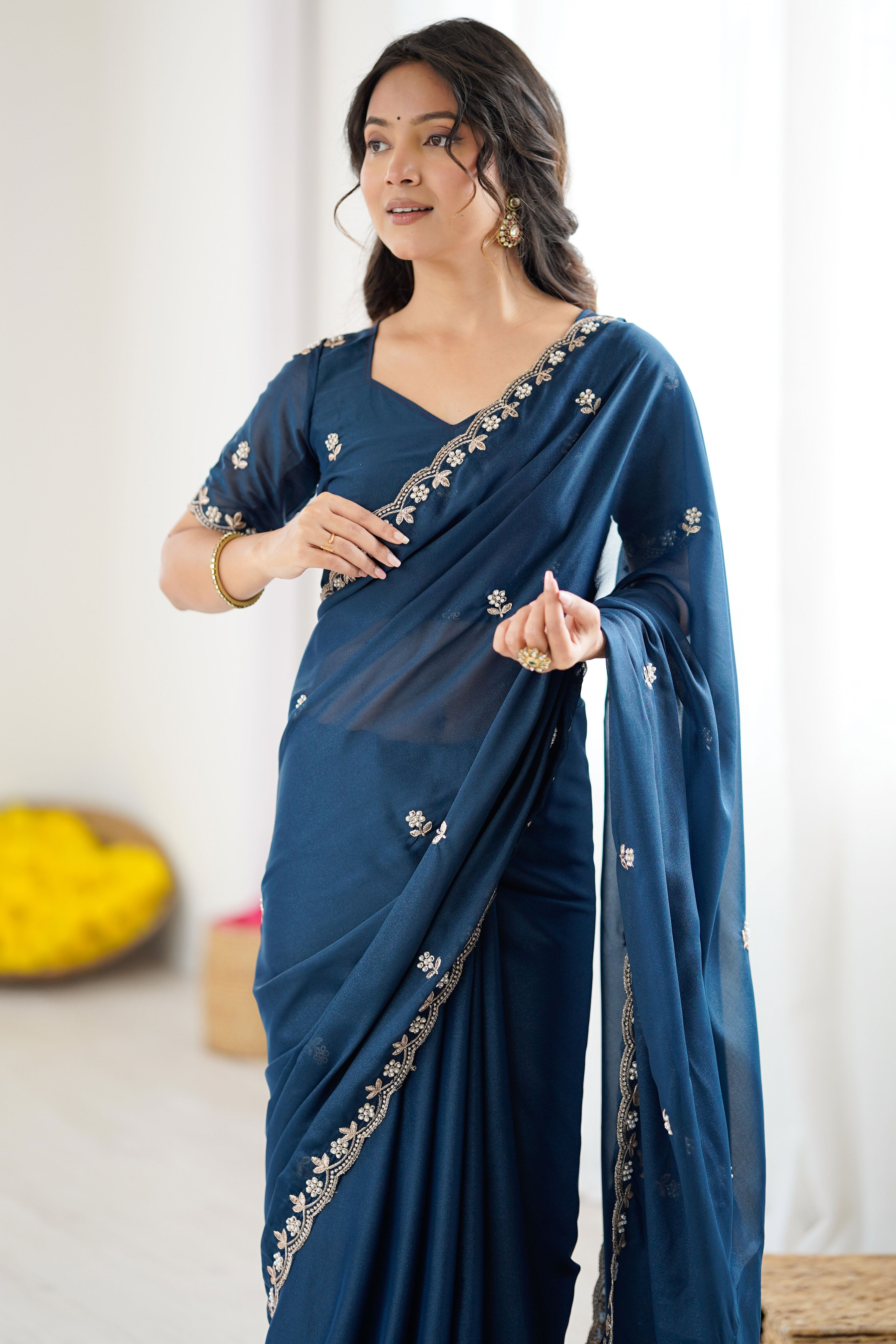 Blue Partywear Star Georgette Saree Adorned with Floral Embroidery and Beads Work