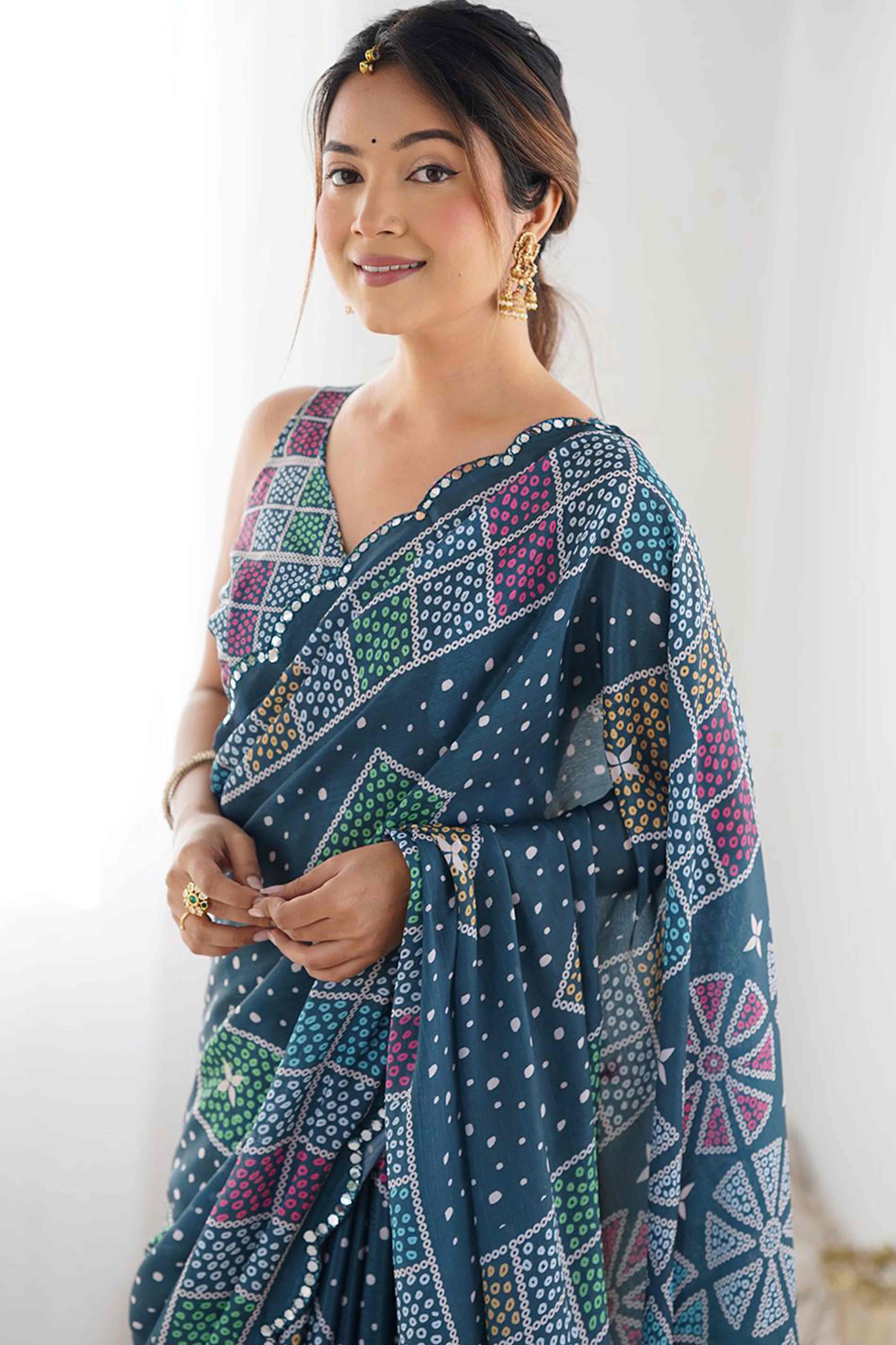 Morpich Blue Bandhani Digital Print Georgette Saree Enhanced With A Sparkling Lace Border