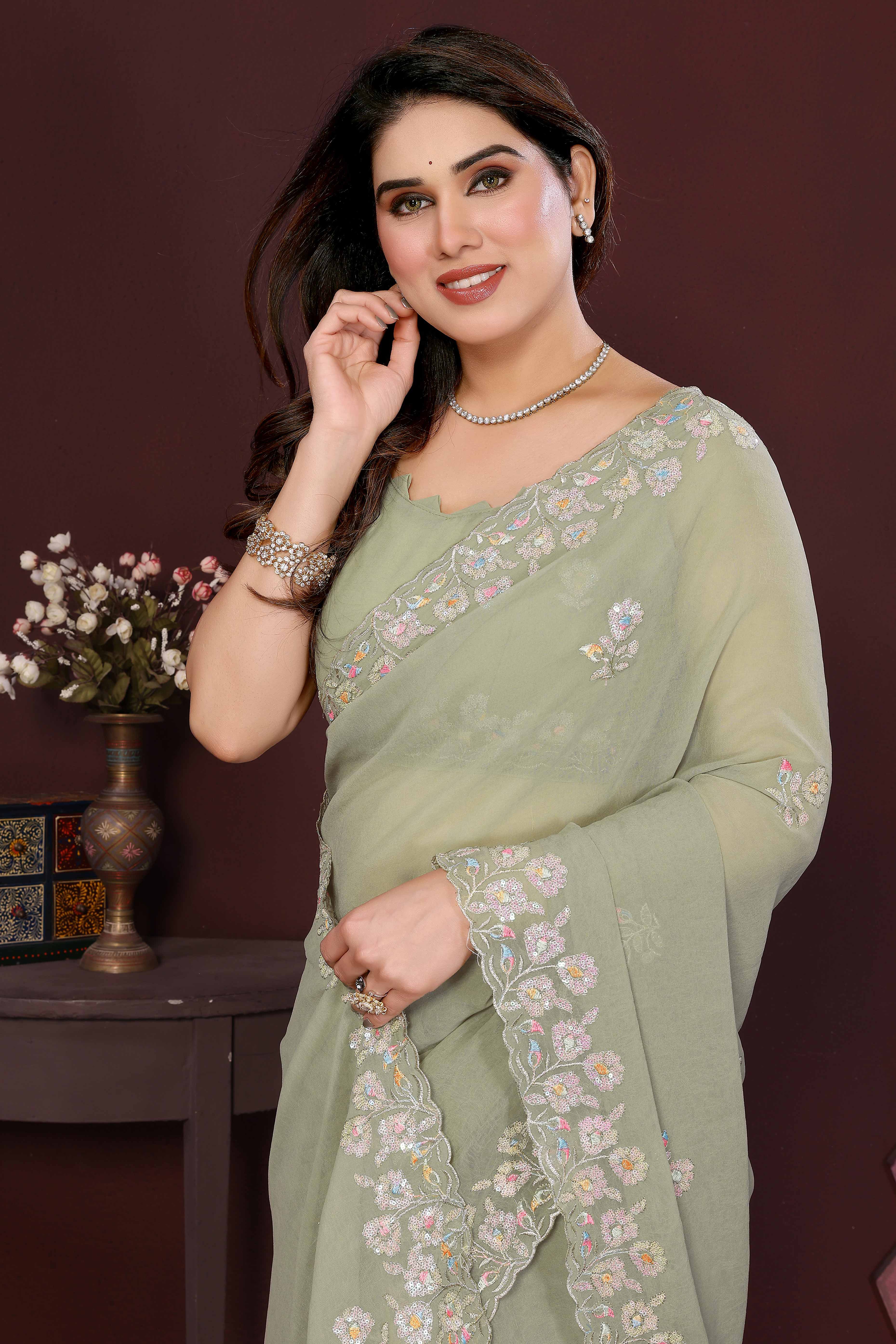 Pista Green Georgette Saree Featuring Intricate Floral Sequin Embroidery