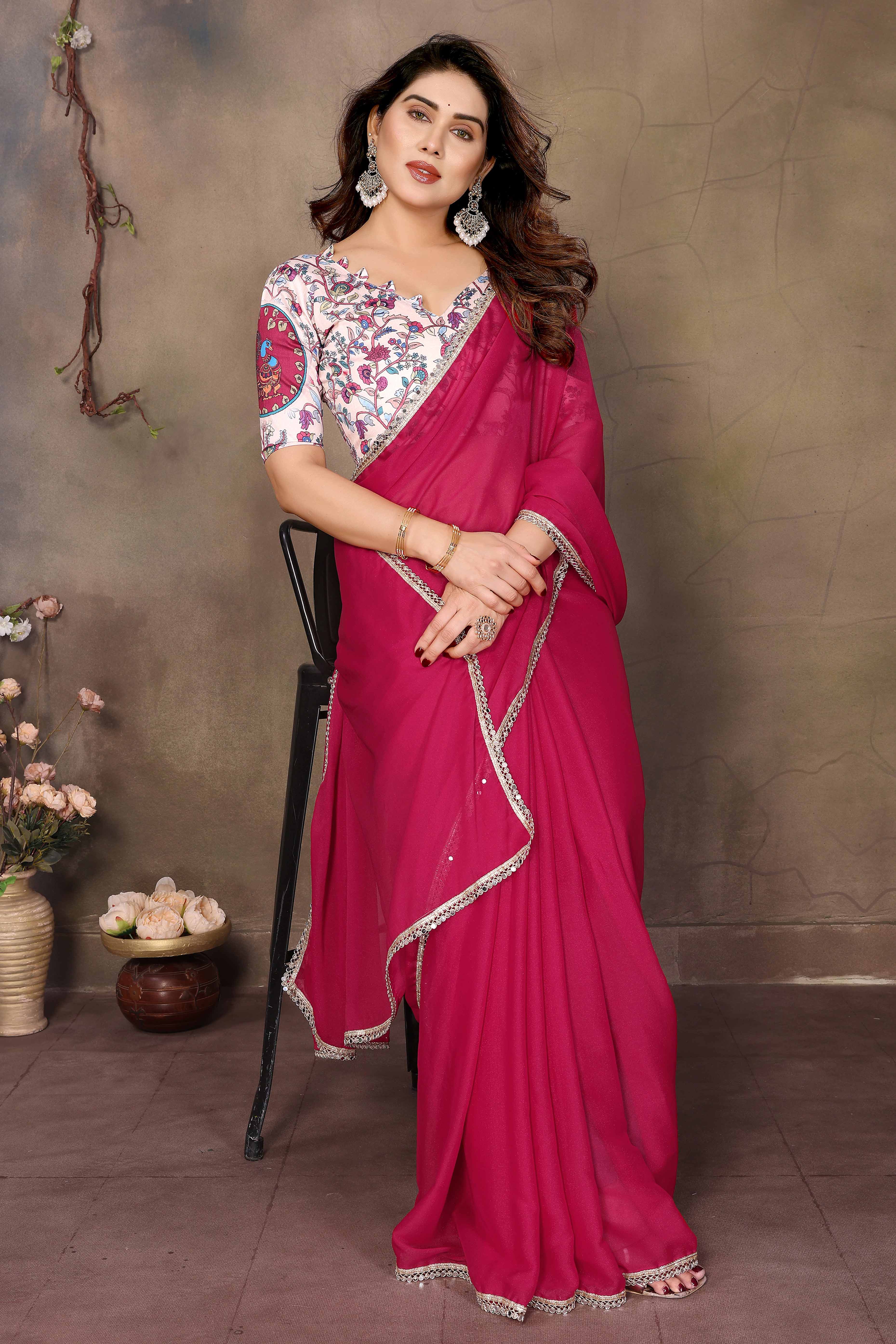 Pink Solid Sparkling Georgette Saree Enhanced With Shimmering Mirror Border