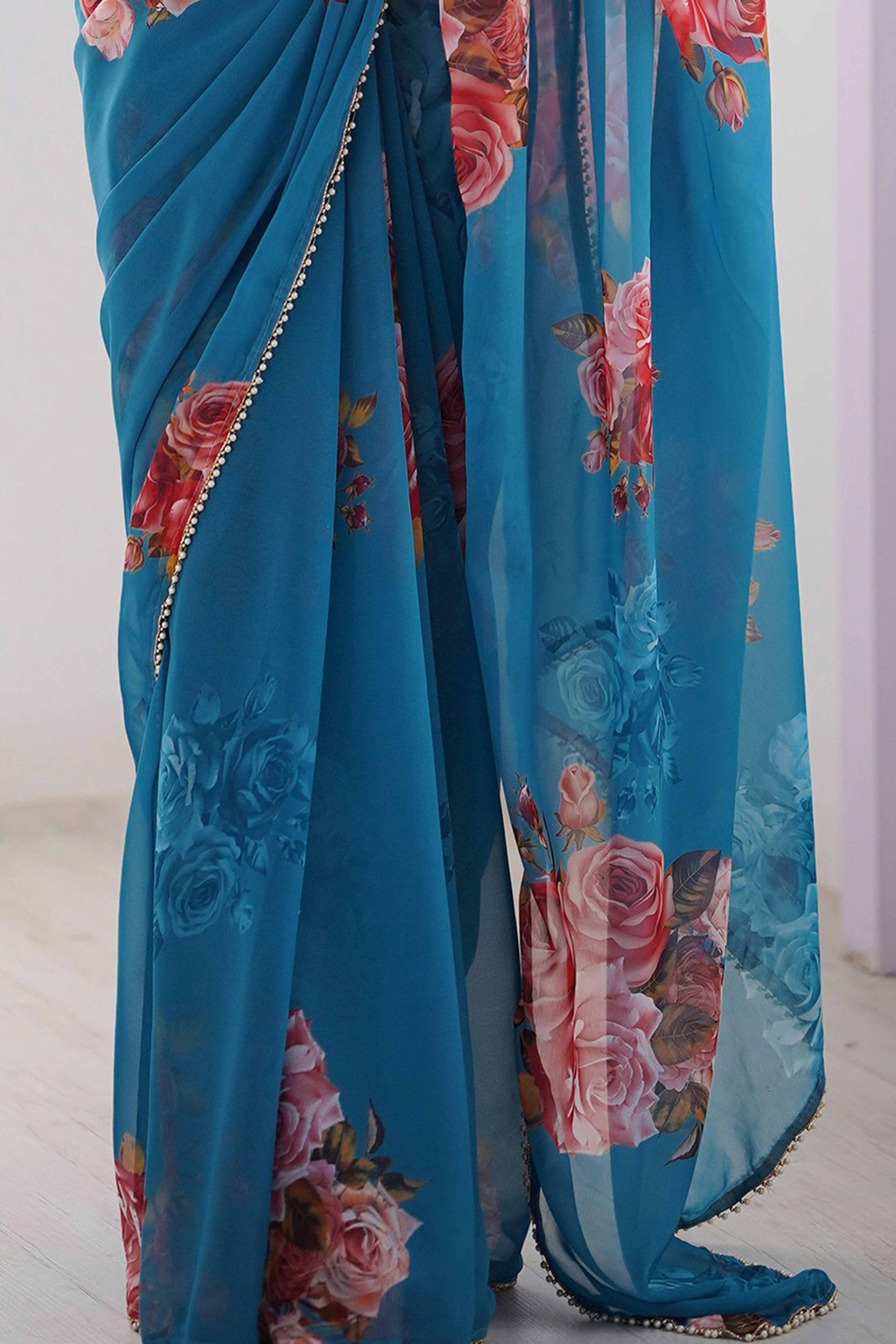 Partywear Teal Georgette Saree with Floral Prints and Bead Work Lace