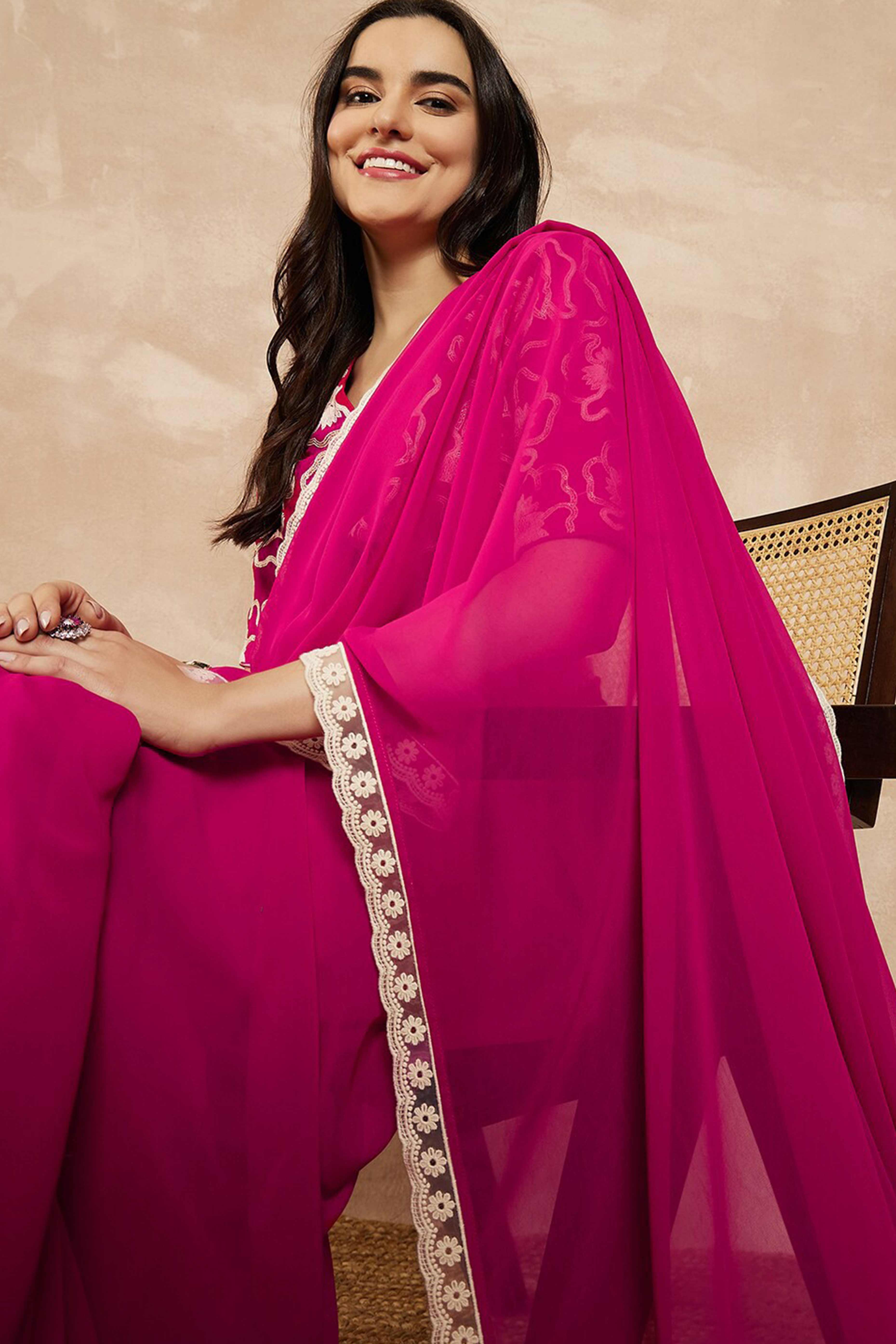 Pink Solid Georgette Saree With Embroidered Border