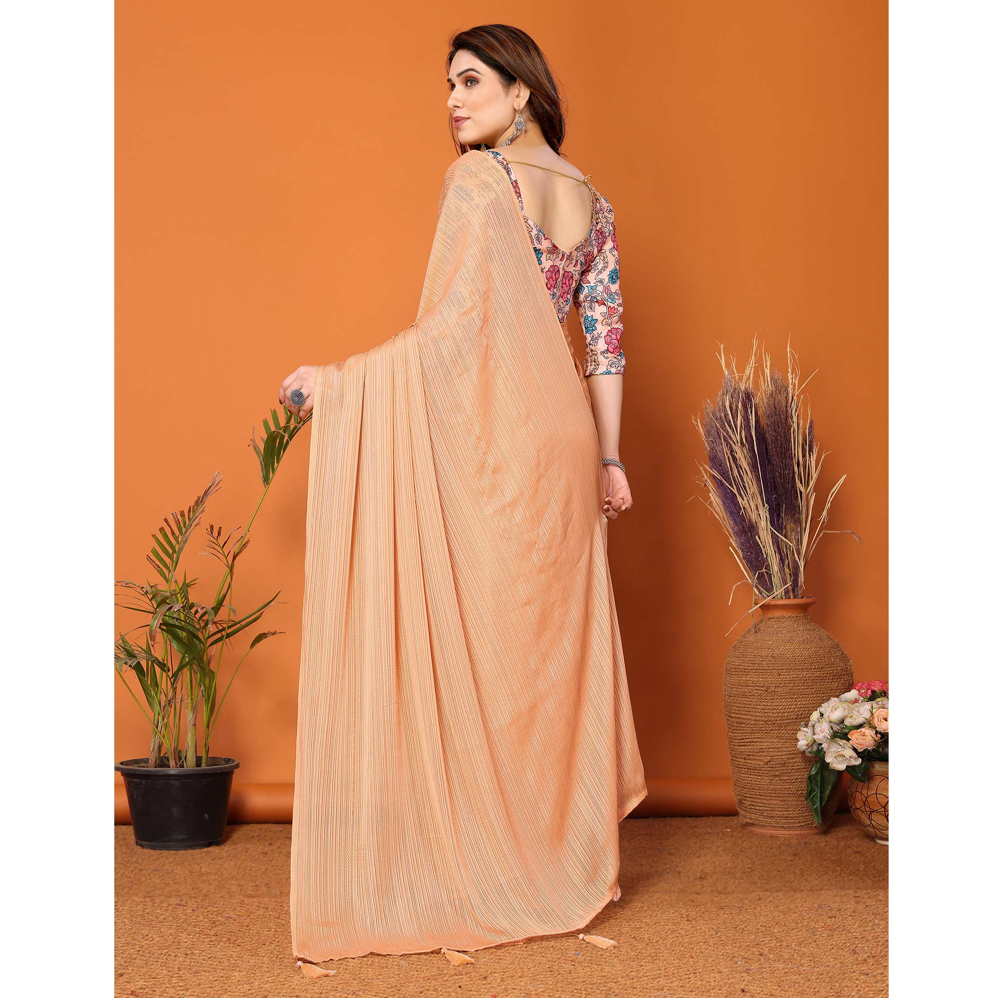 Light Orange Woven Satin Saree With Tassels