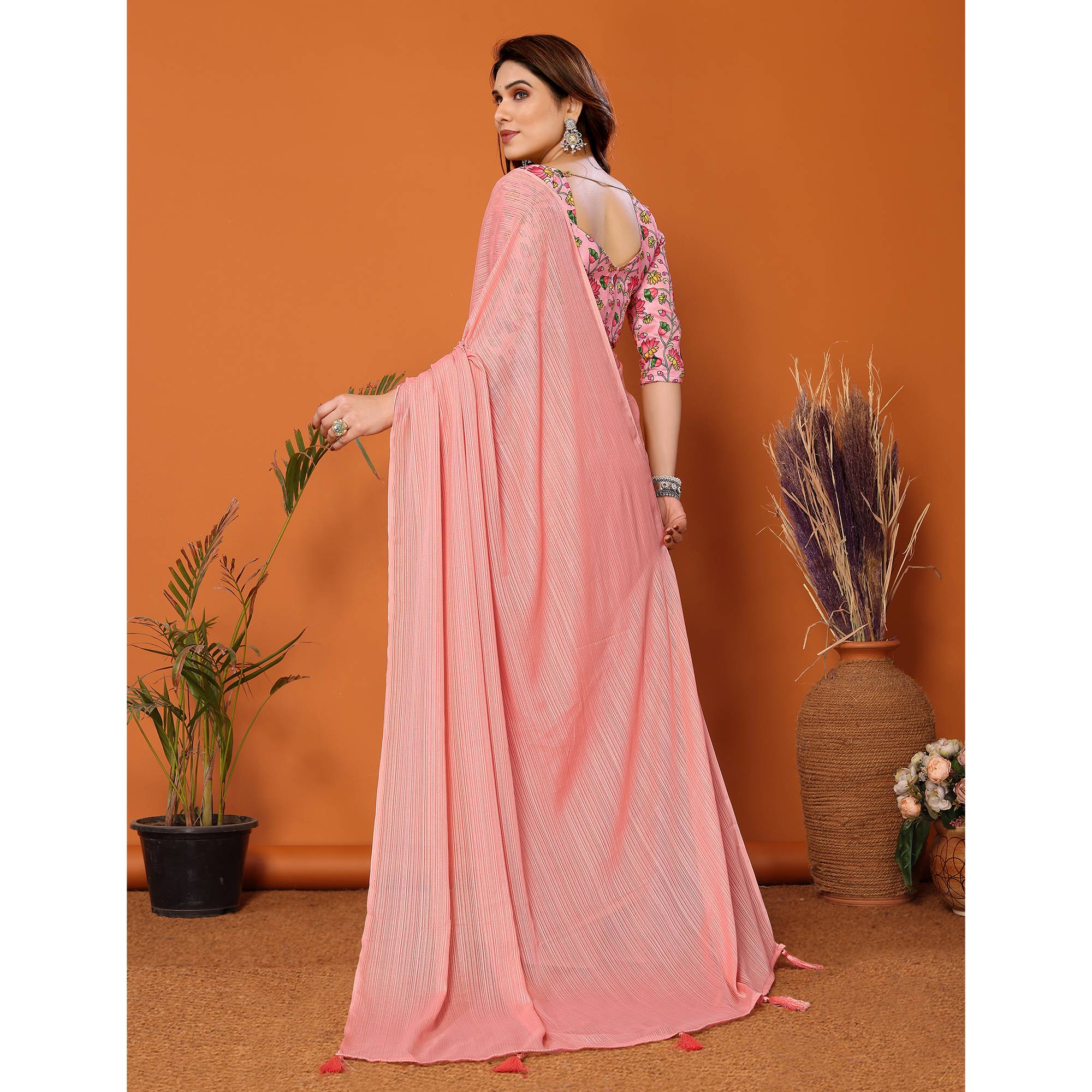 Peach Woven Satin Saree With Tassels