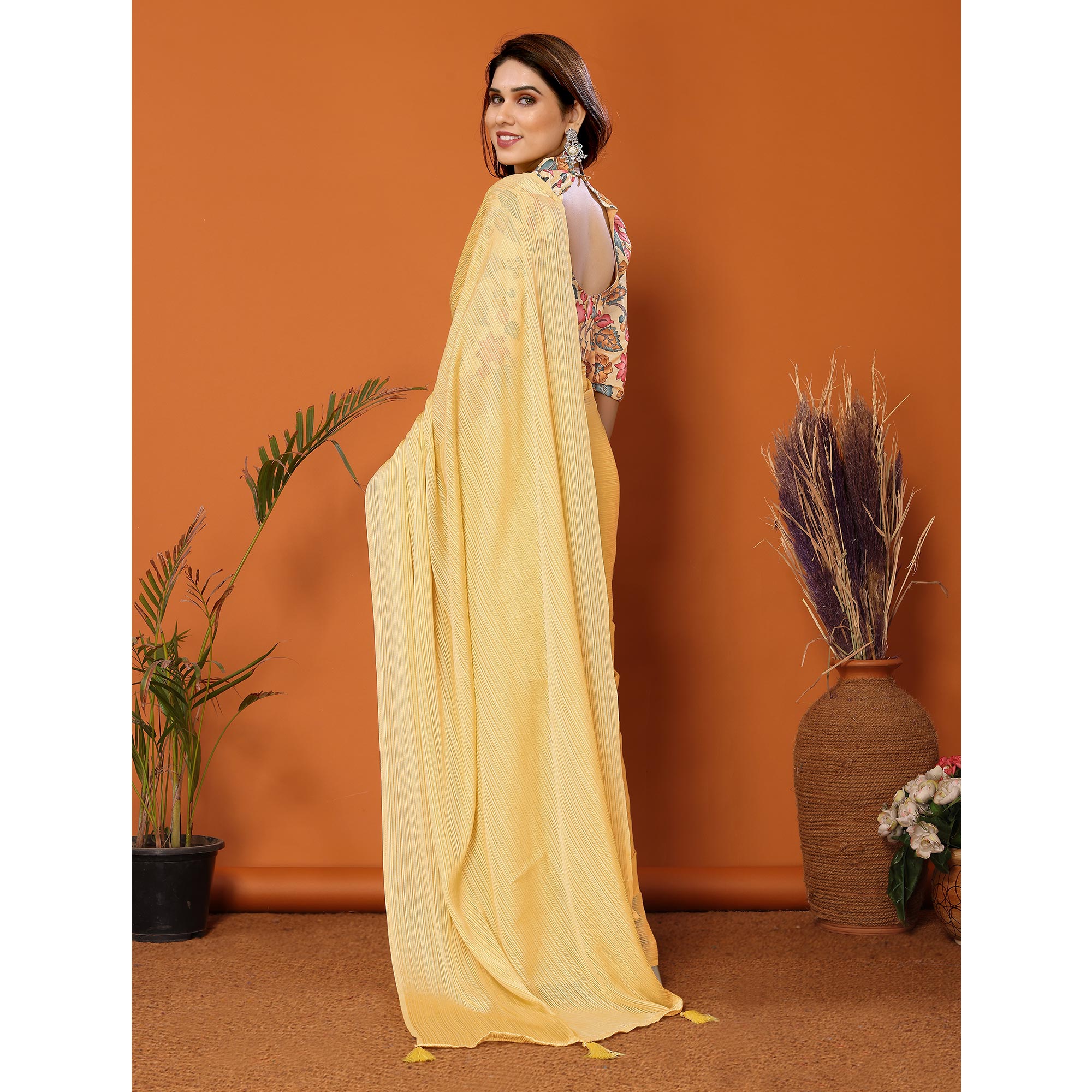 Yellow Woven Satin Saree With Tassels