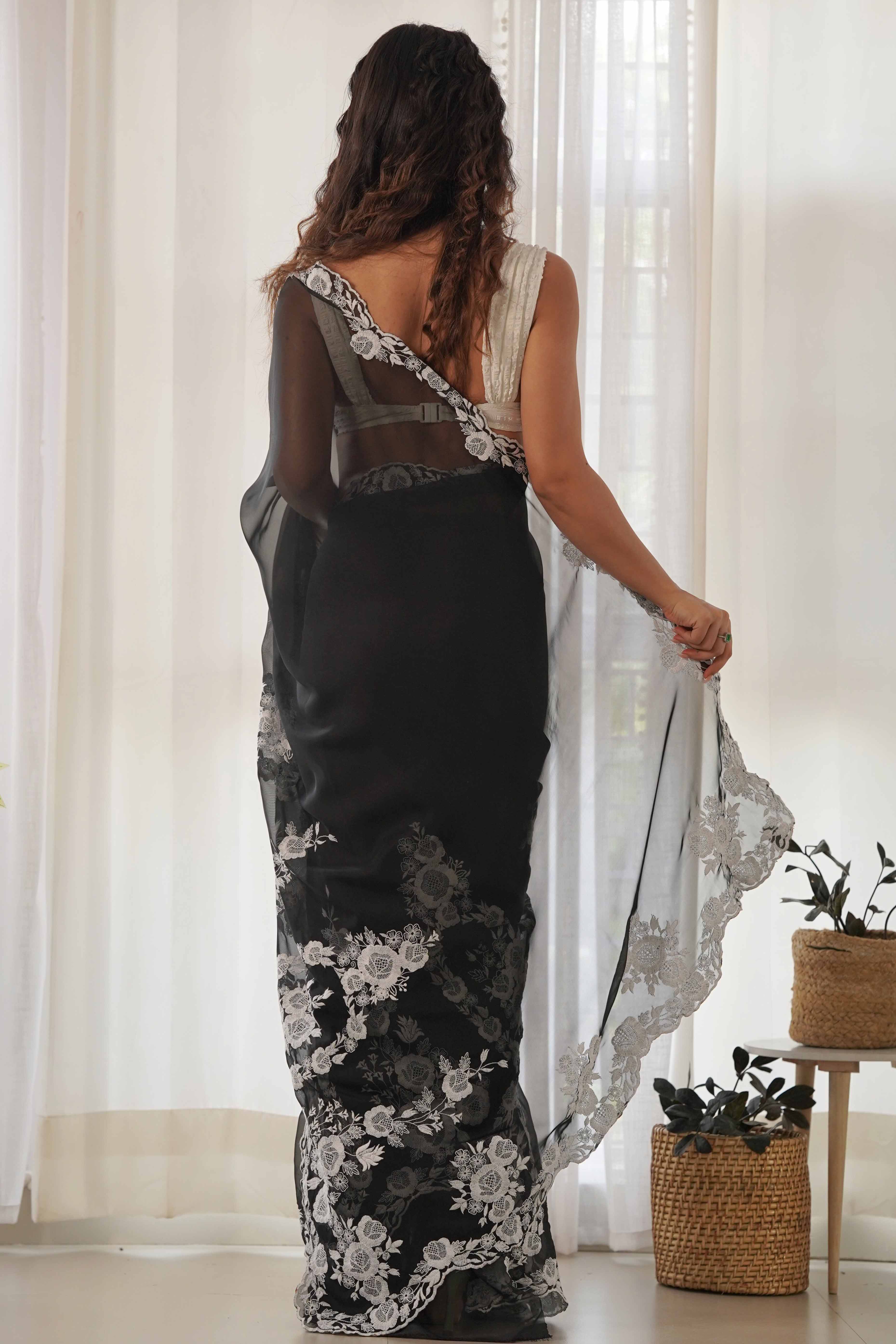 Black Embroidered Georgette Saree Featuring Ornate Heavy Thread Work