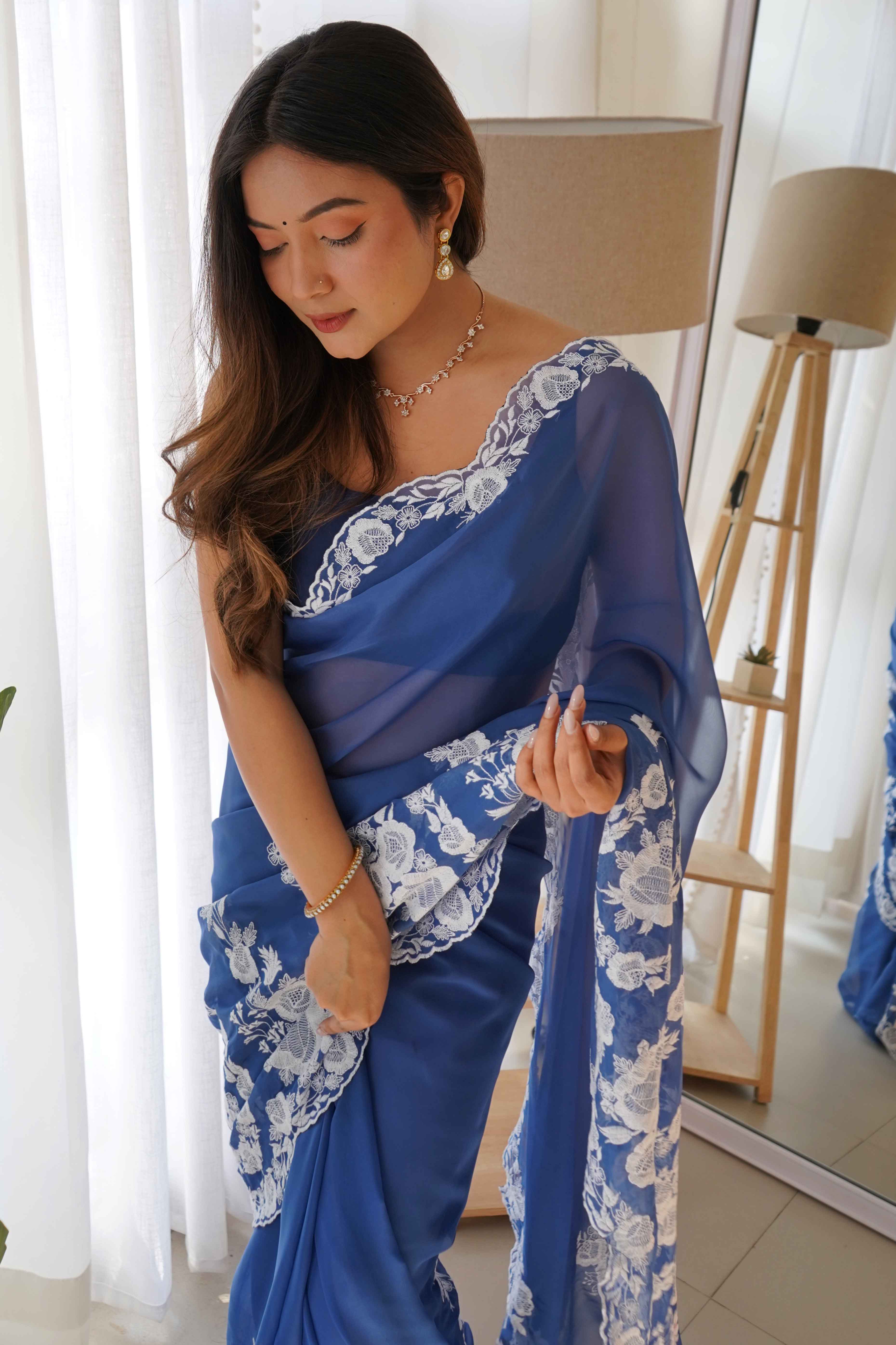 Blue Embroidered Georgette Saree Featuring Ornate Heavy Thread Work