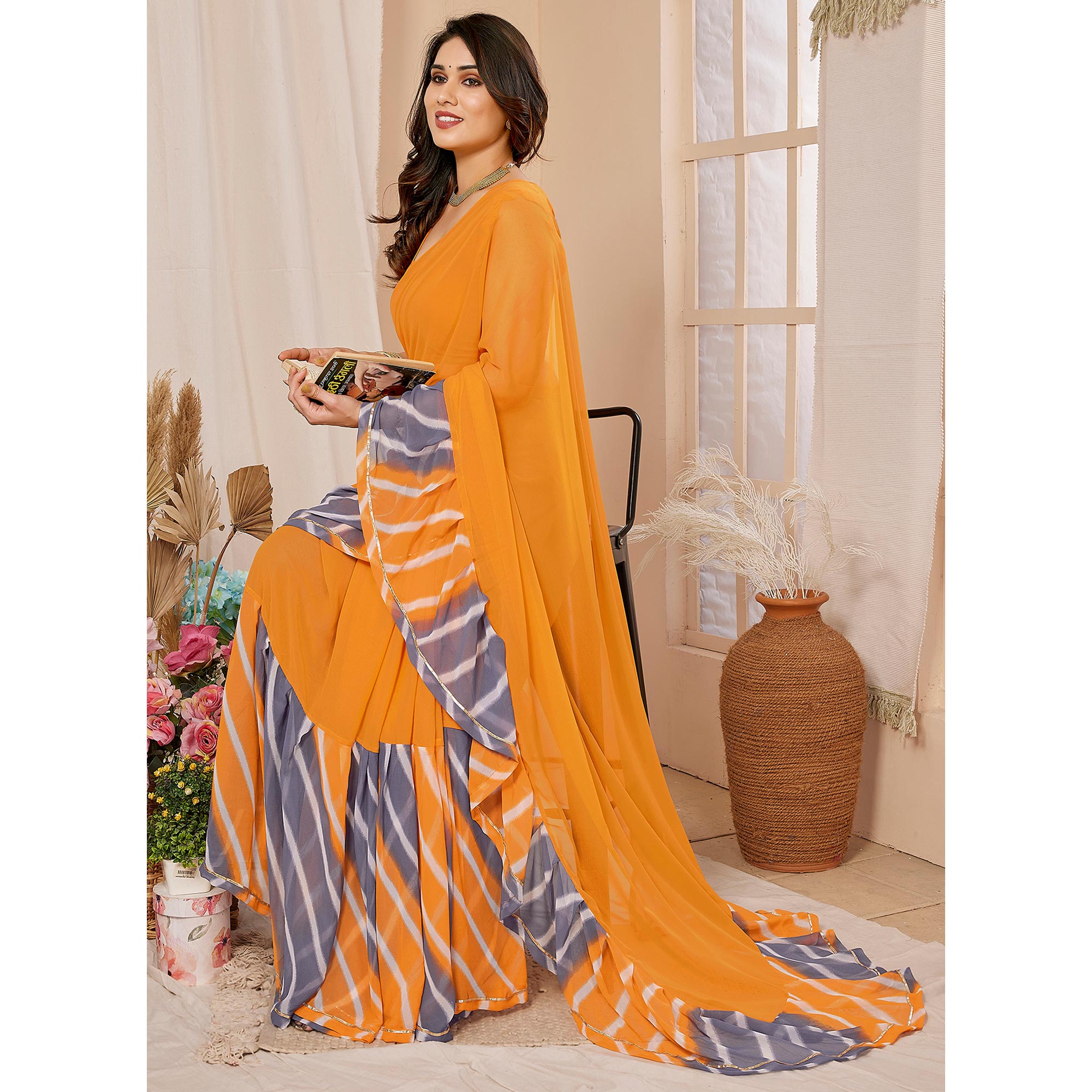 Orange Solid Georgette Saree With Printed Ruffle Border