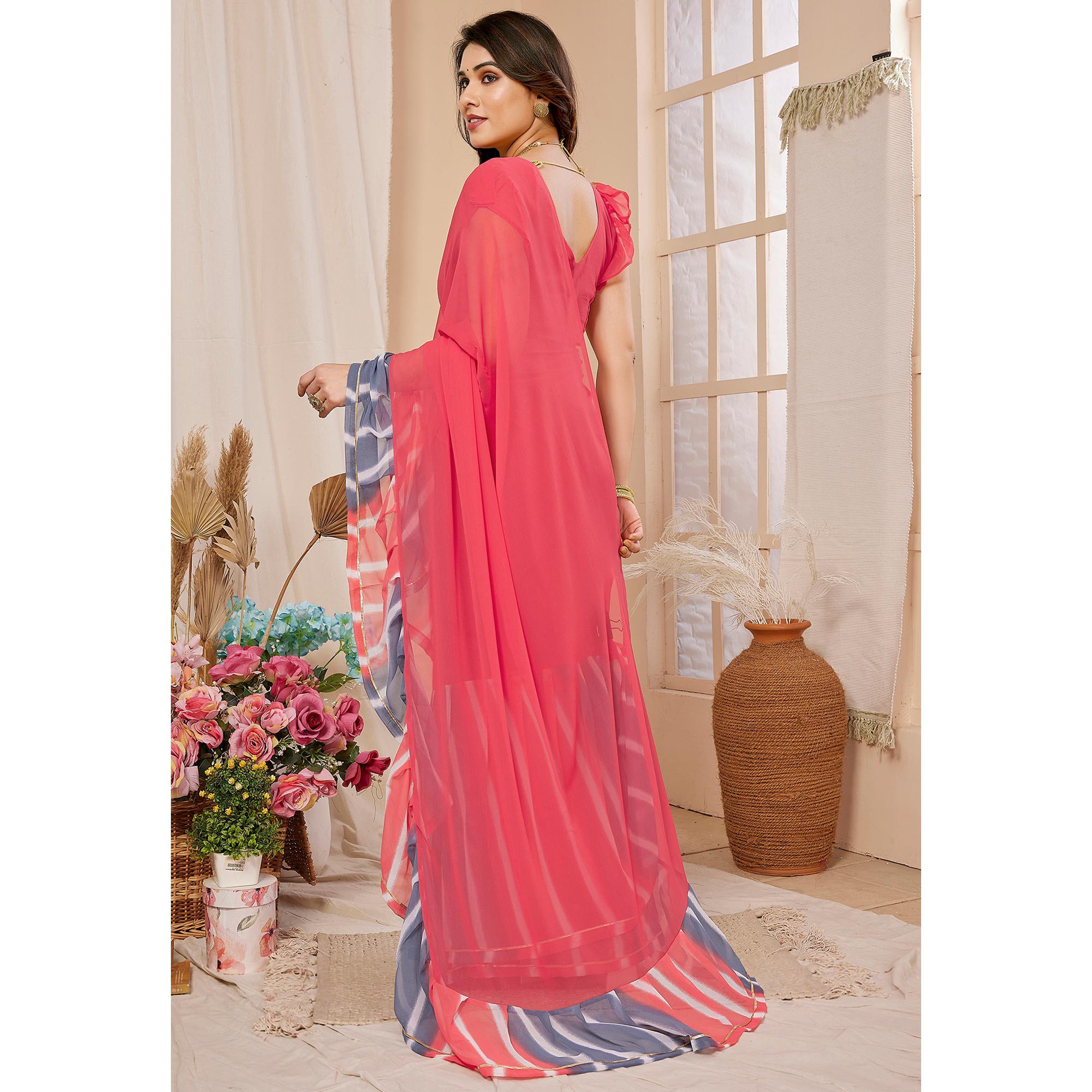 Pink Solid Georgette Saree With Printed Ruffle Border