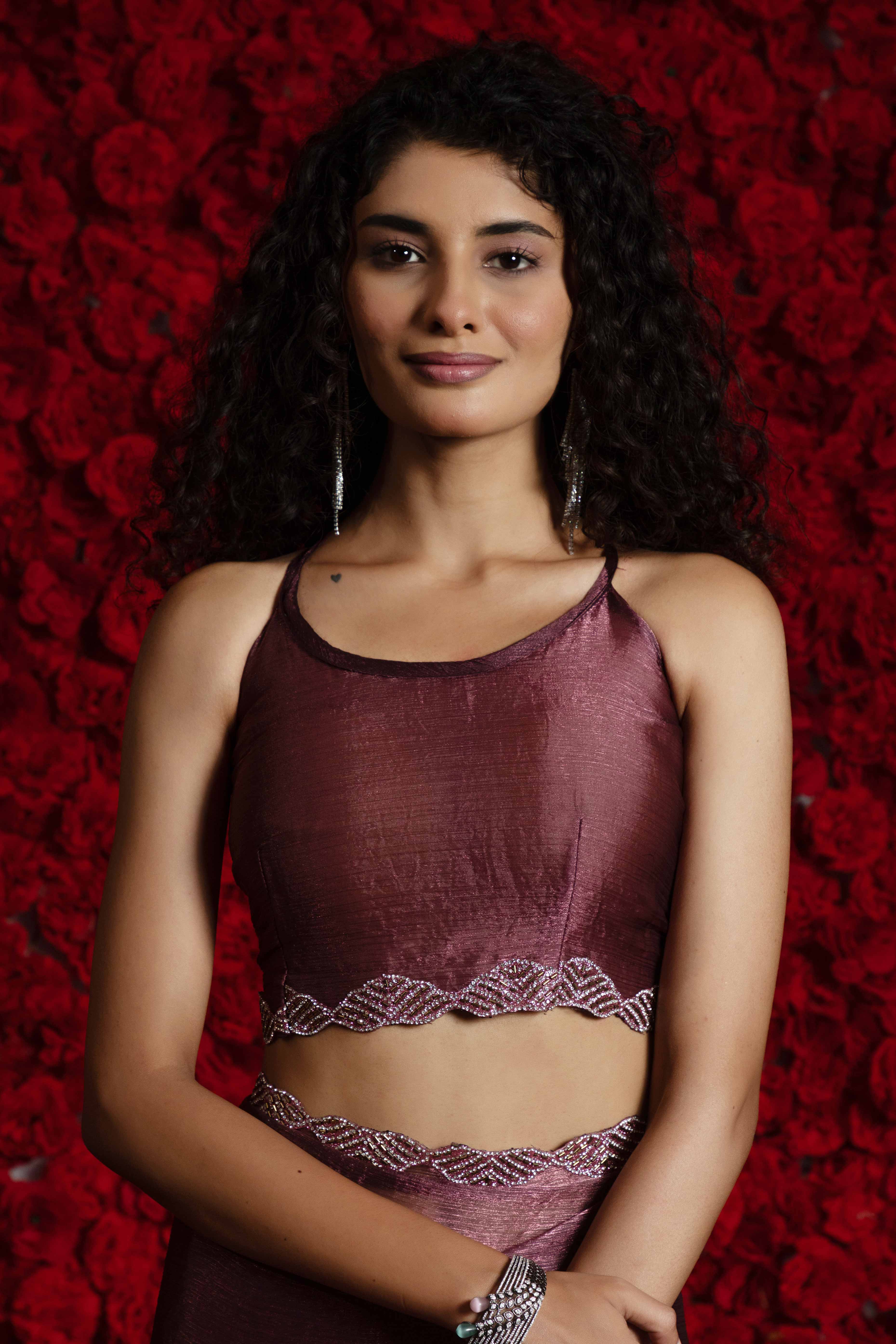 Burgundy Solid Tissue Chiffon Saree Accentuated With A Sparkling Zarkan Work Border