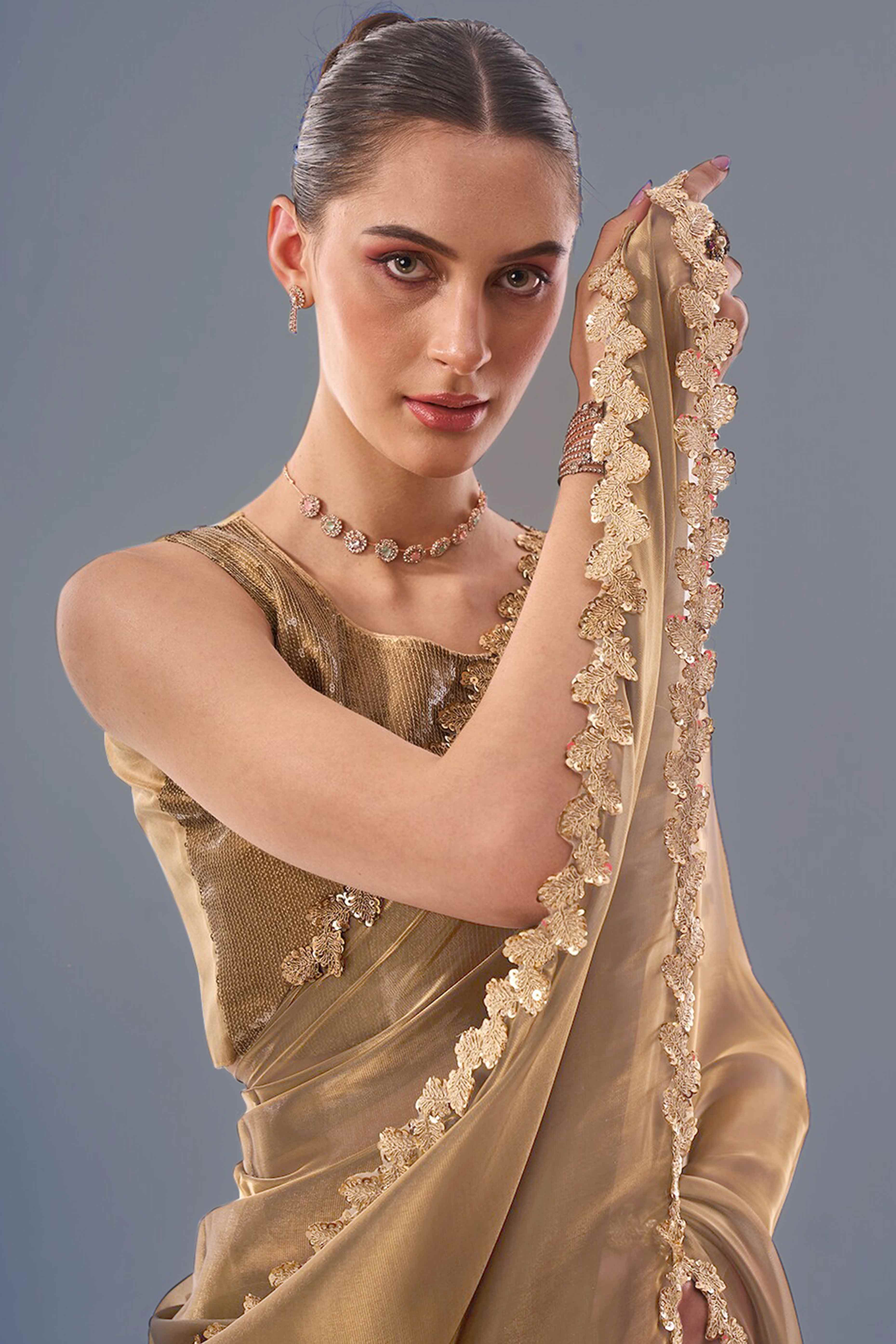 Golden Solid Tissue Jimmy Choo Saree With Sequins Embroidered Cut Work Lace