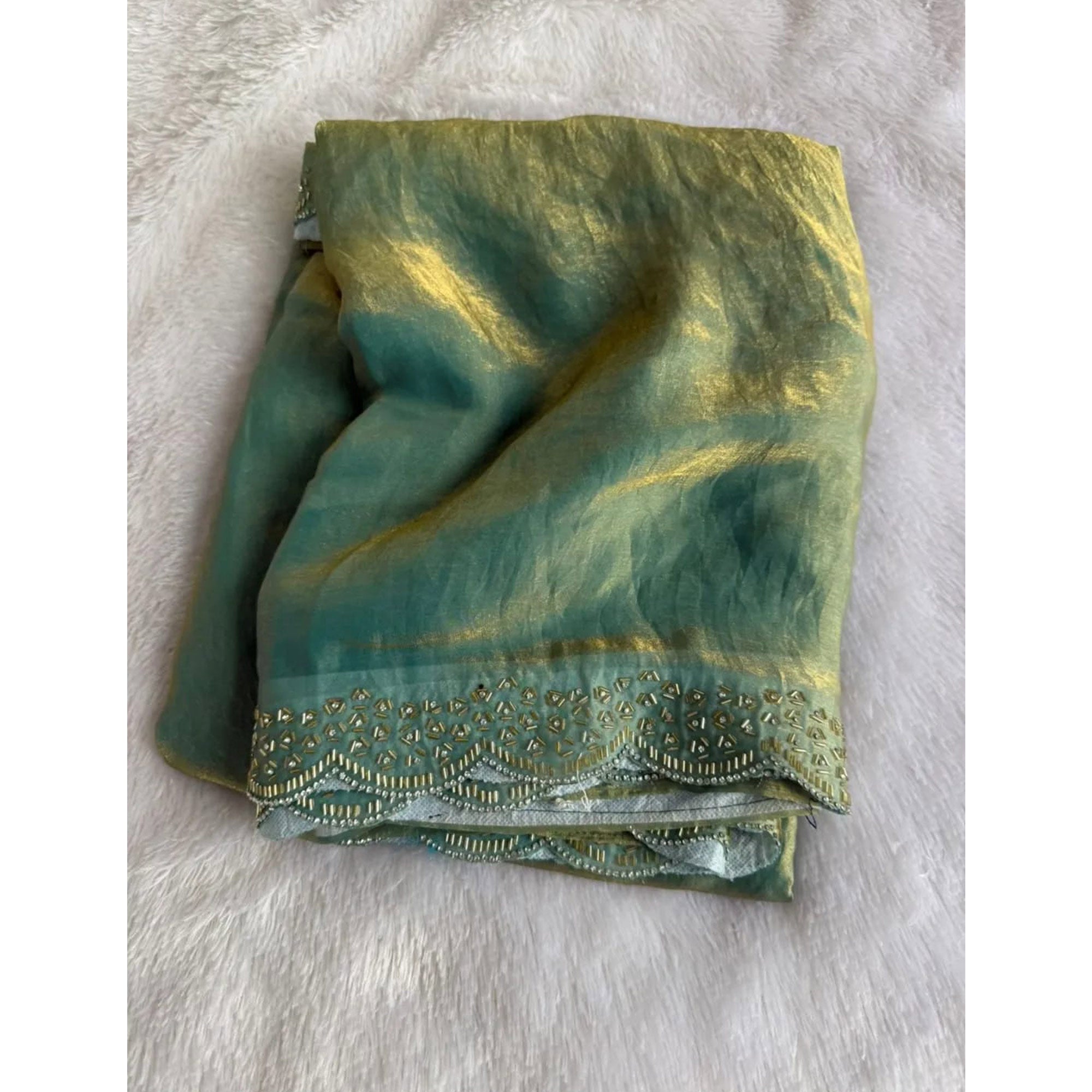 Elegant Sea Green Satin Saree Embellished in Gold Shine