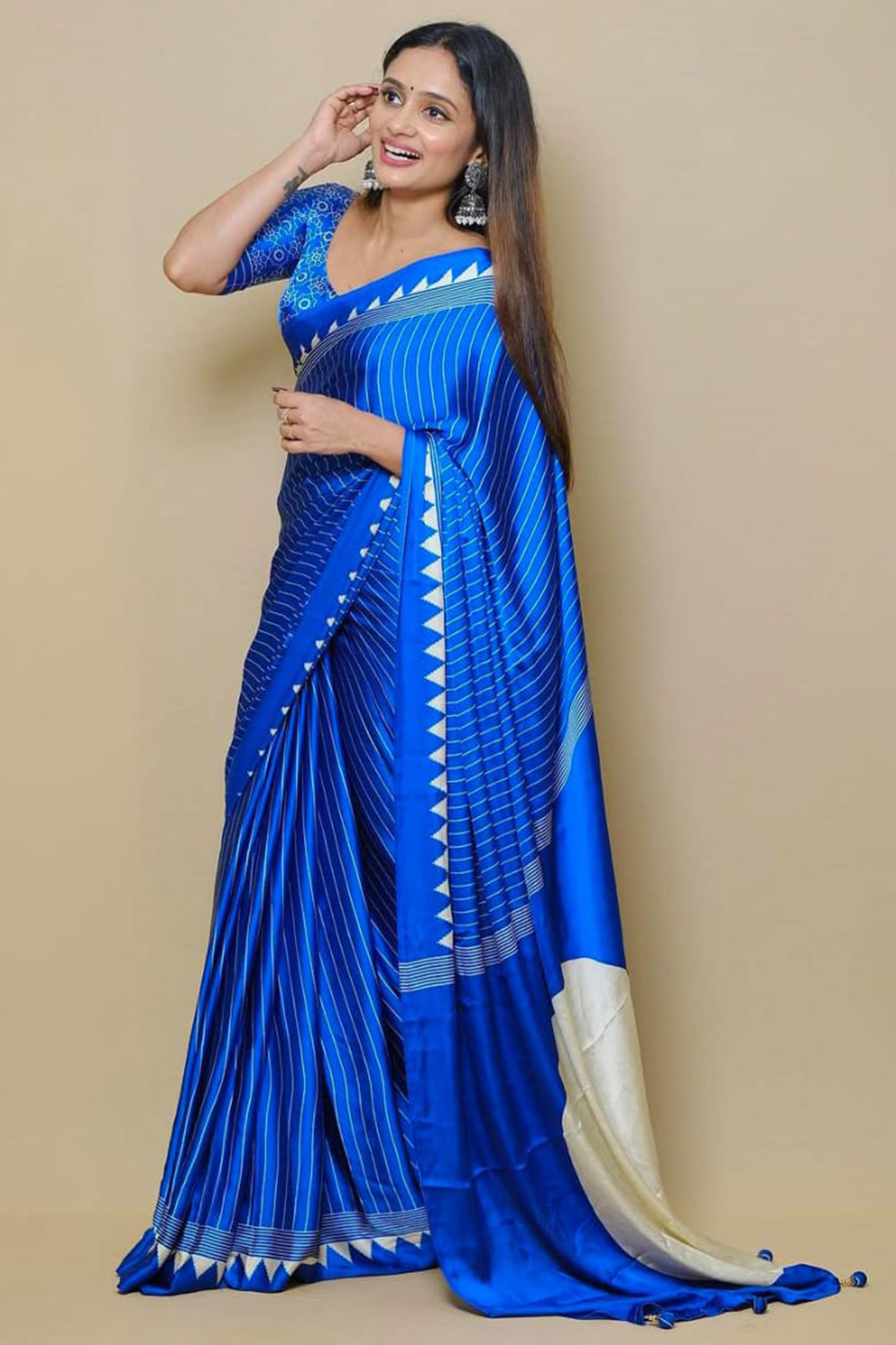 Blue Crepe Saree with Bold Striped Print and Smooth Finish for Partywear