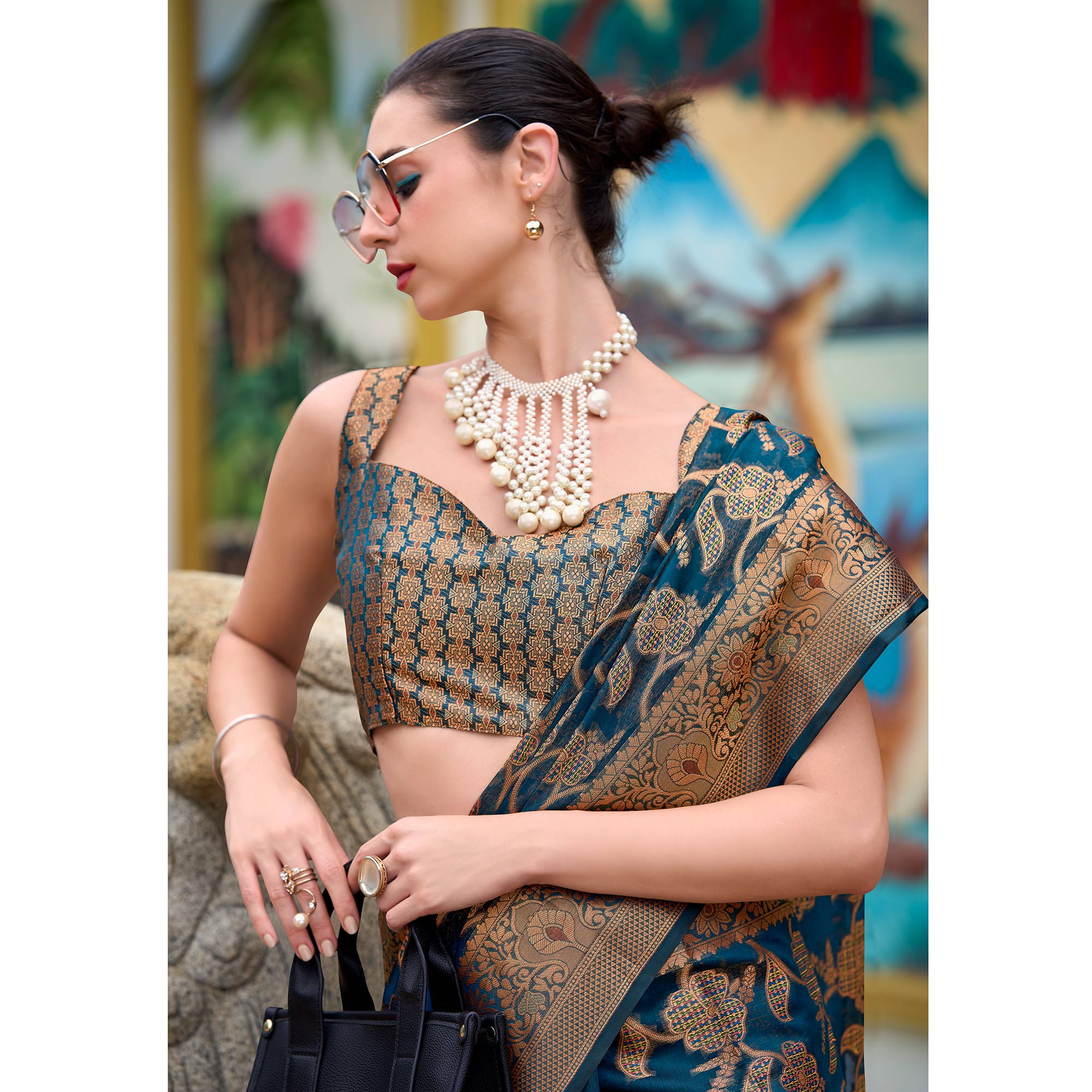 Teal Floral Motifs Woven Organza Saree