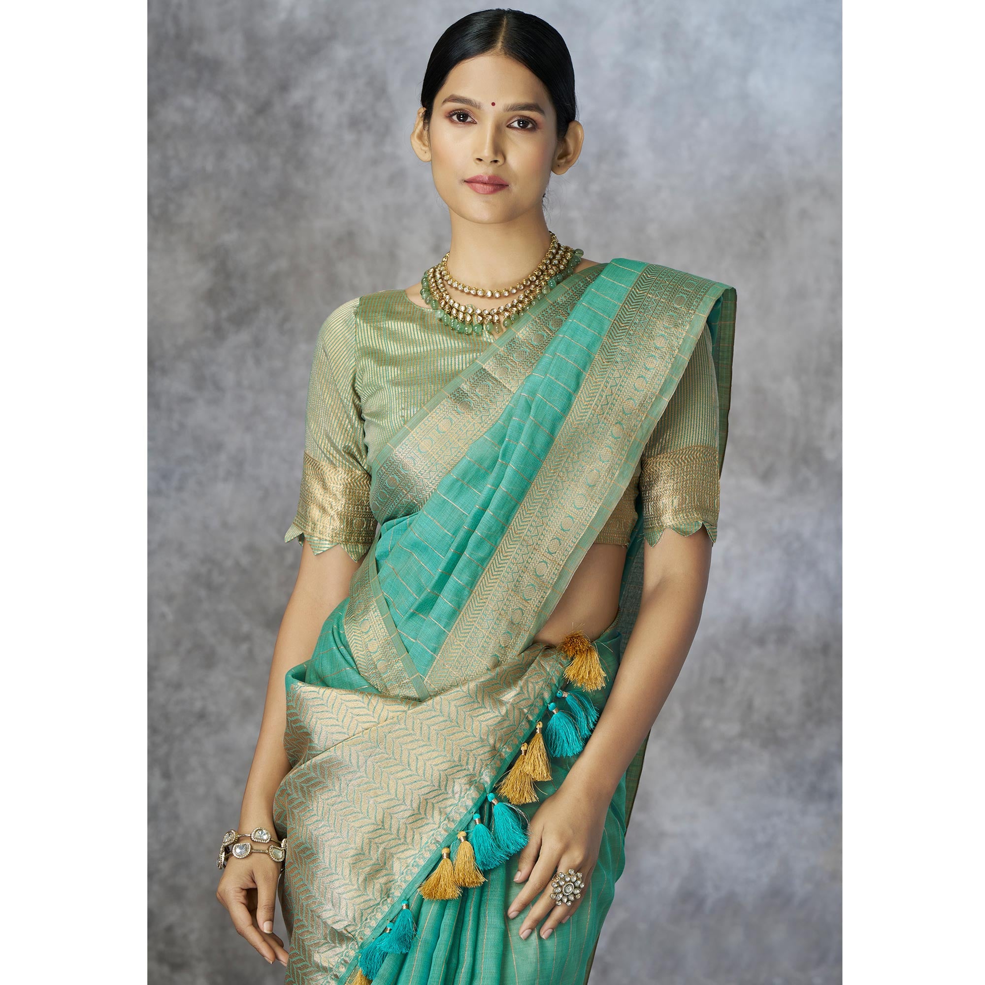 Turquoise Woven Cotton Silk Saree With Tassels