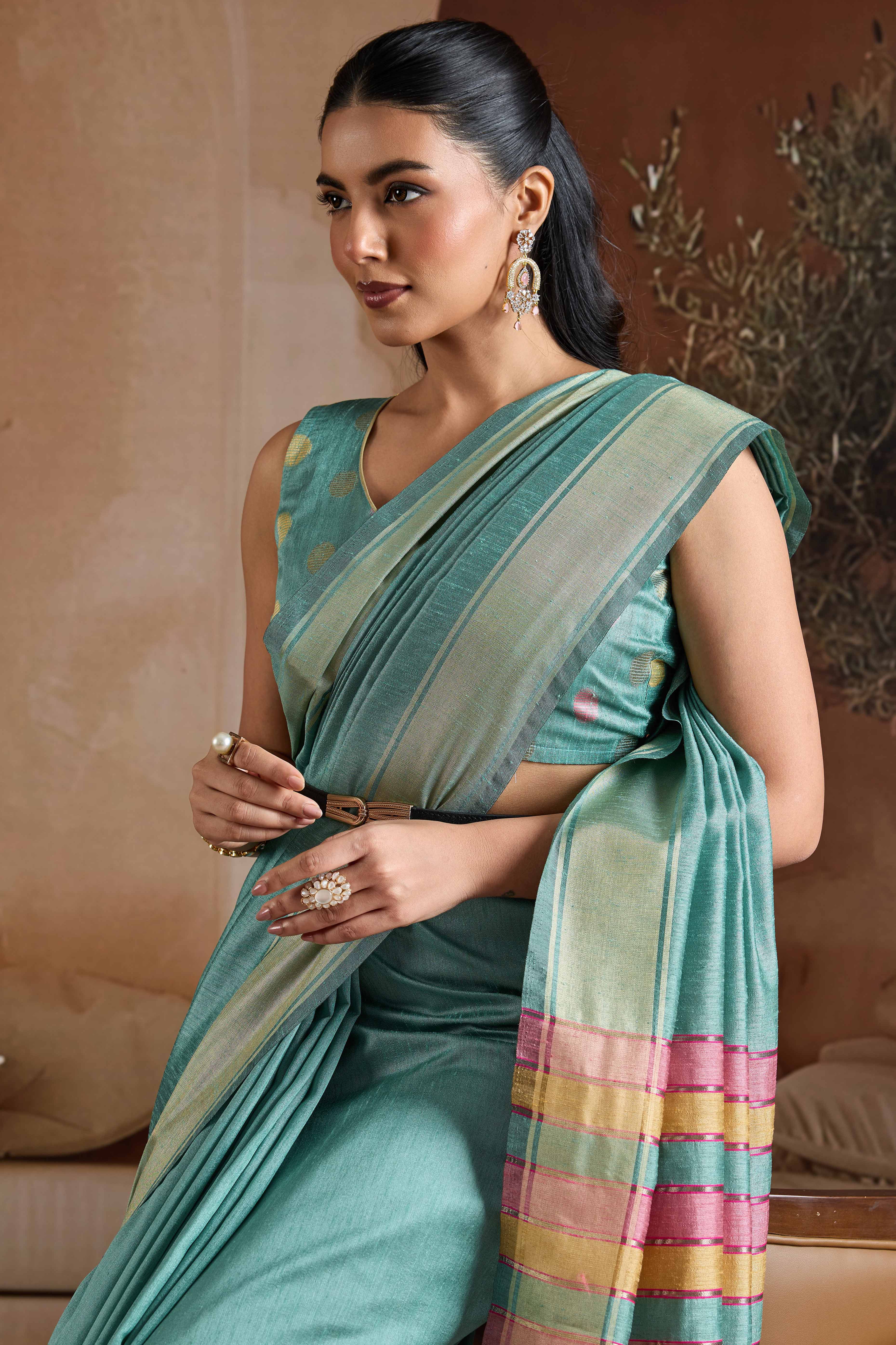 Graceful Turquoise Zari Woven Bhagalpuri Silk Saree Accented With Tassel Pallu