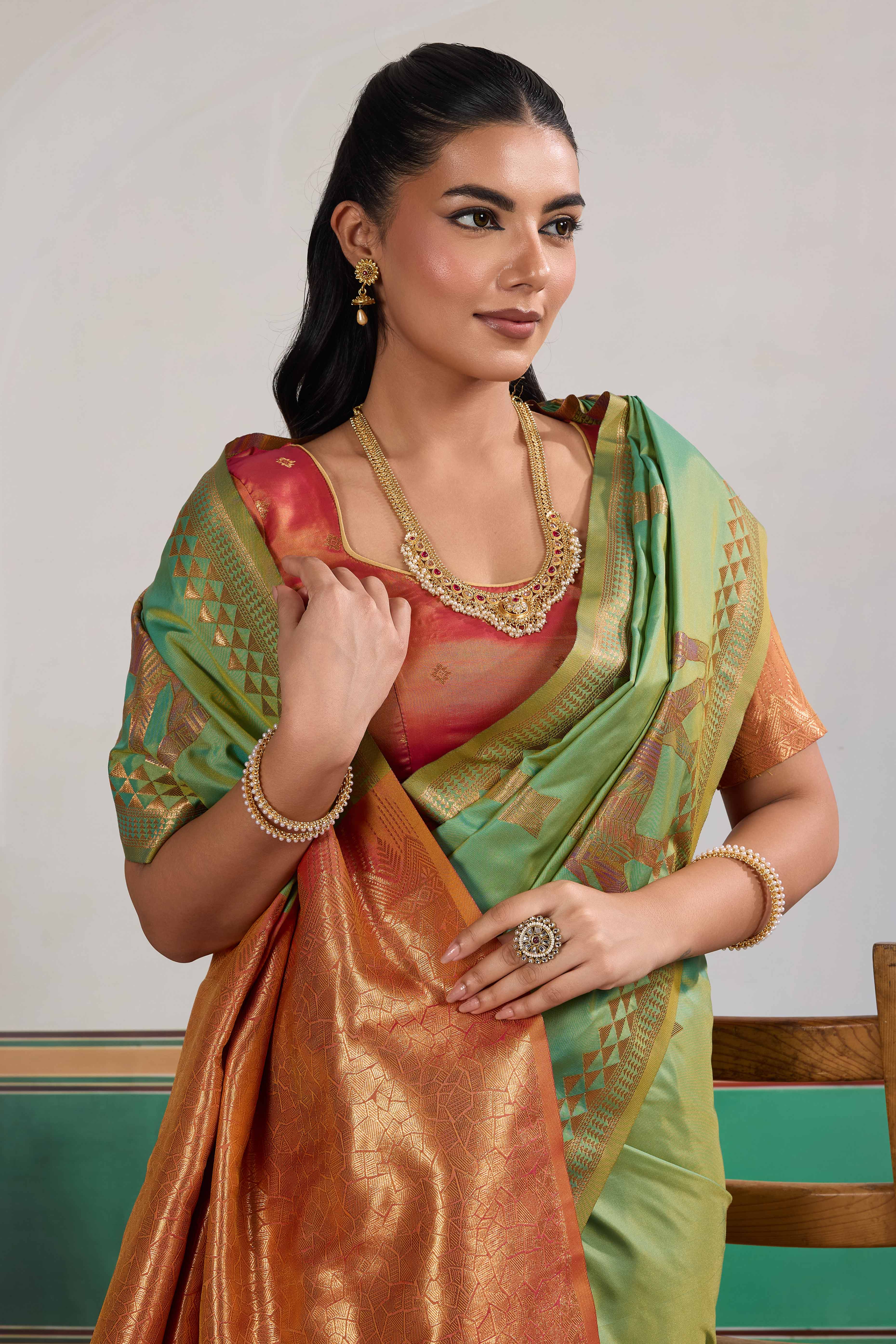 Traditional Green Pure Silk Saree Featuring Elephant Motif Zari Weaving & Tassel Pallu
