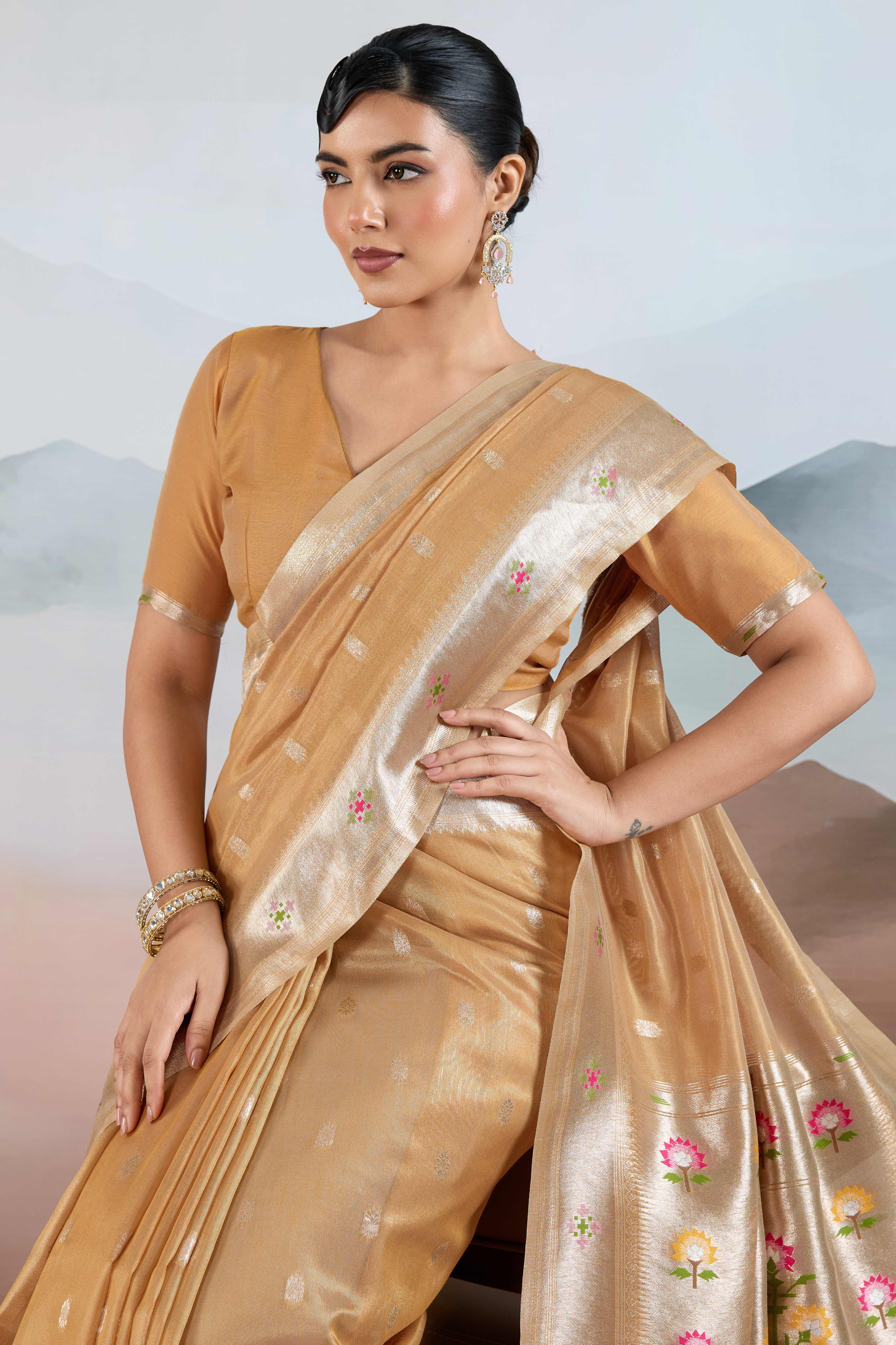 Beige Festive Tissue Saree Crafted with Artistic Zari Butti Weaving and a Featherlight Texture