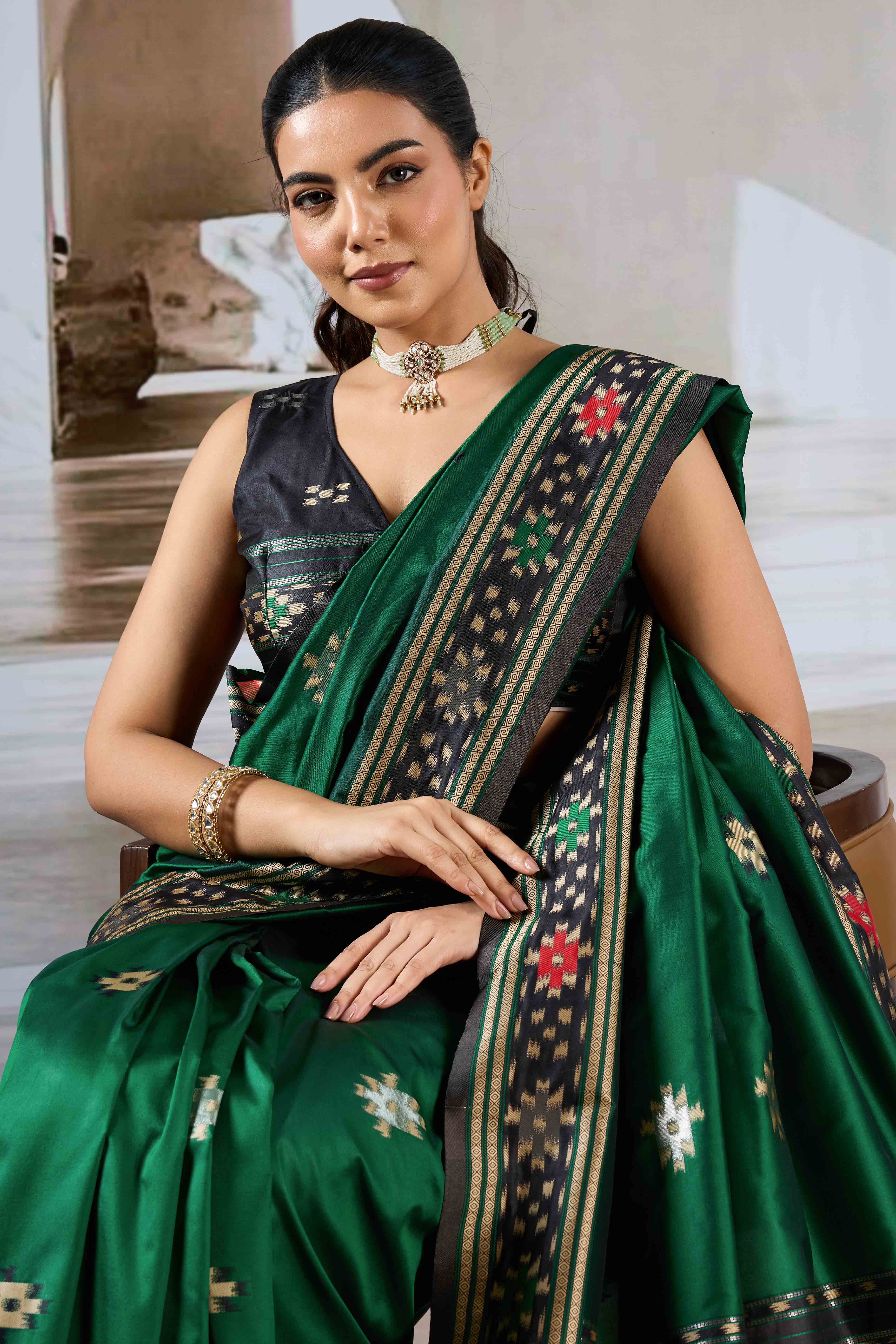 Green Art Silk Saree Adorned with Intricate Patola Style Woven Designs