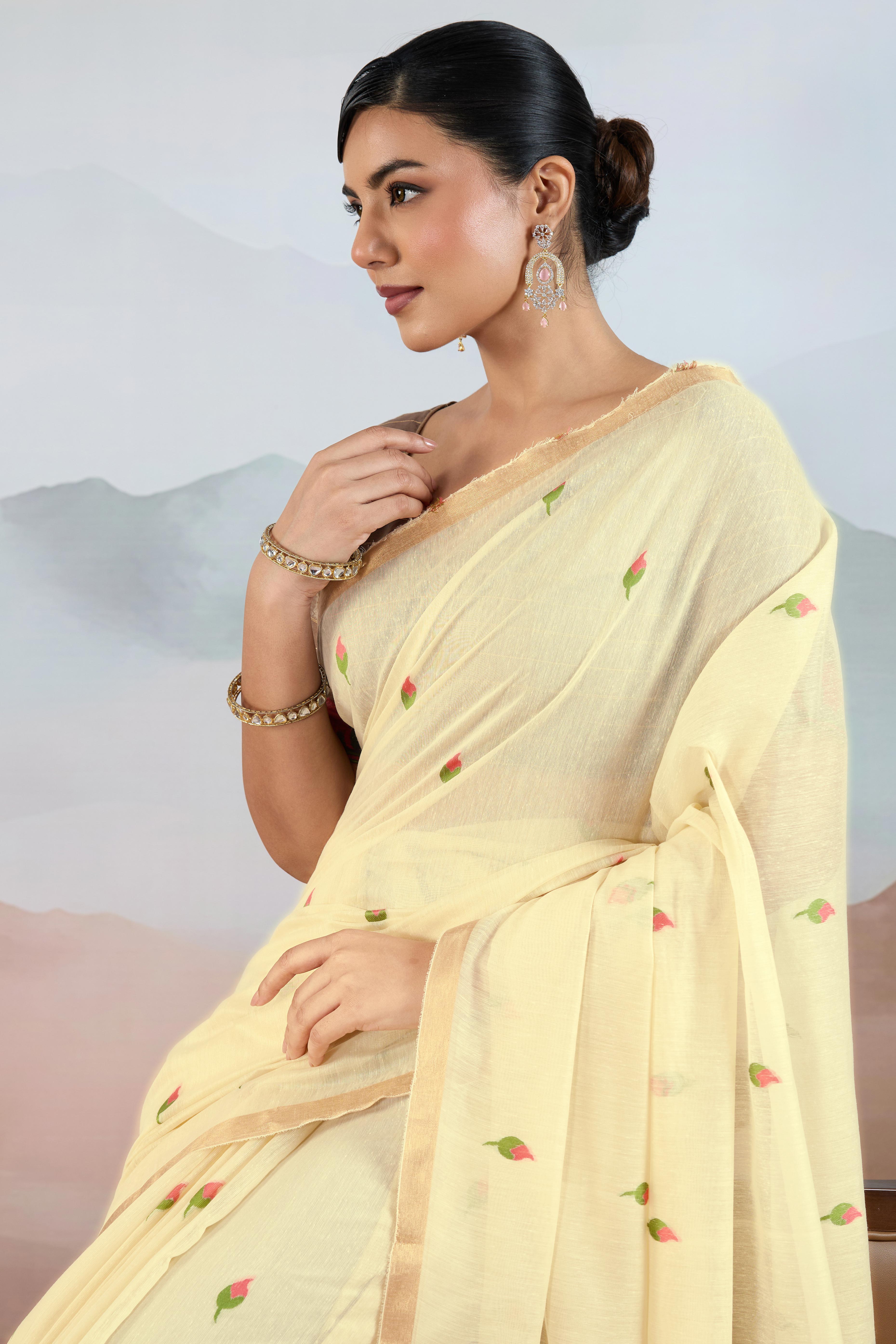 Trendy Cream Cotton Blend Weaving Saree Showcasing Floral & Animal Motif & Classic Tassel Pallu