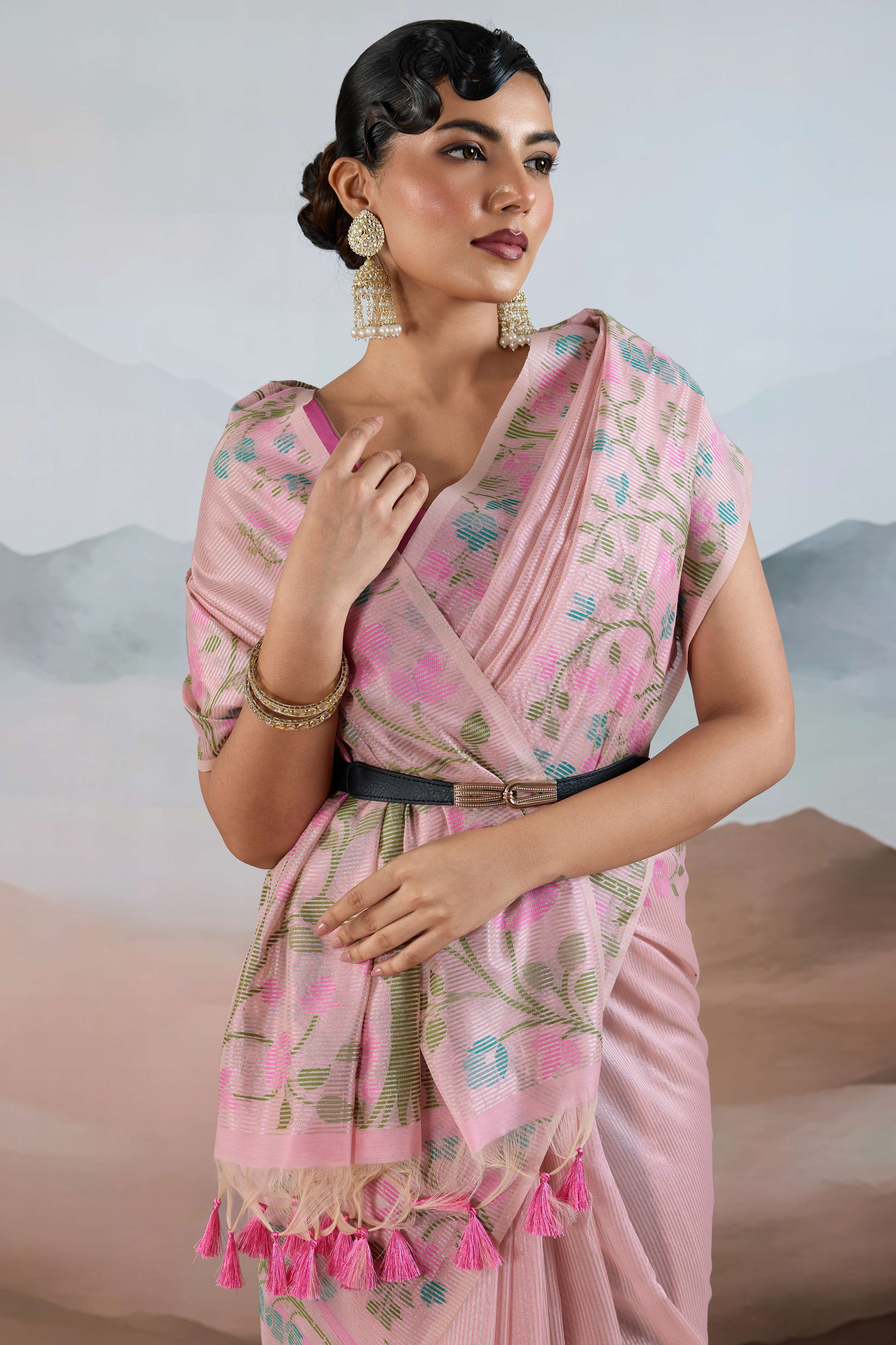 Pink Tissue Silk Saree Showcasing Floral & Striped Weaving With Tassel Adornment