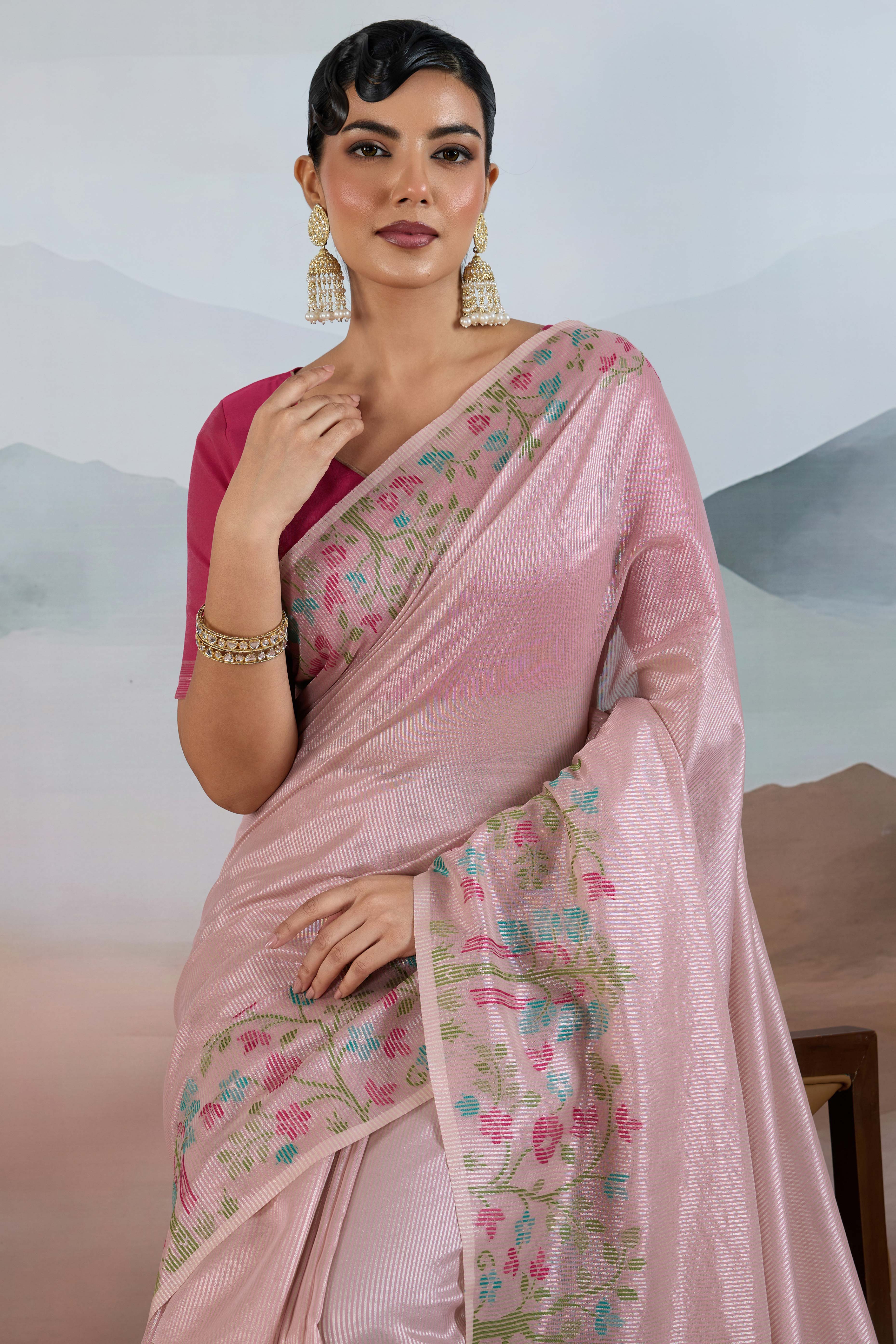 Pink Tissue Silk Saree Showcasing Floral & Striped Weaving With Tassel Adornment