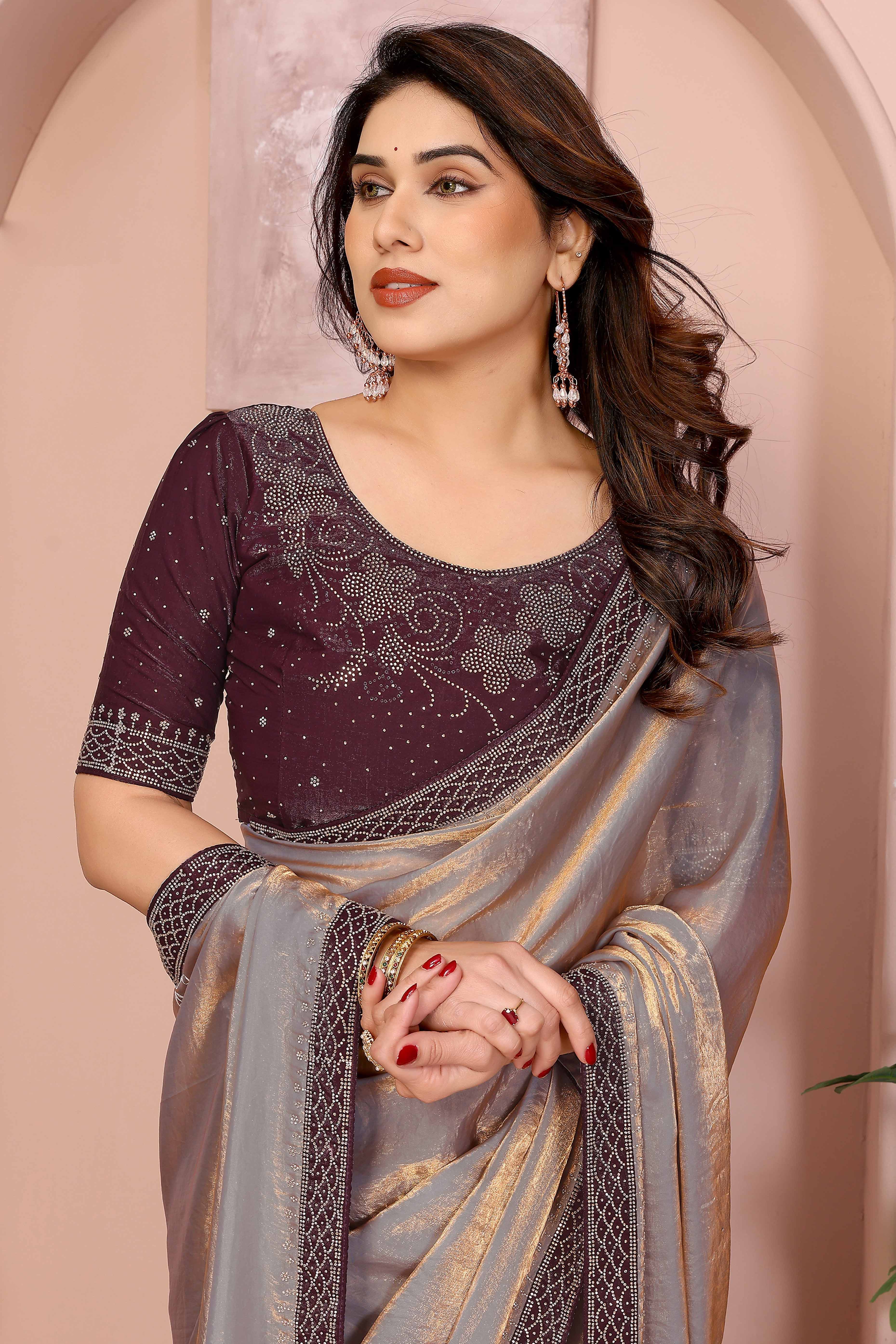 Grey Fancy Satin Saree Featuring a Solid Body and Sparkling Jarkan Work on the Edges