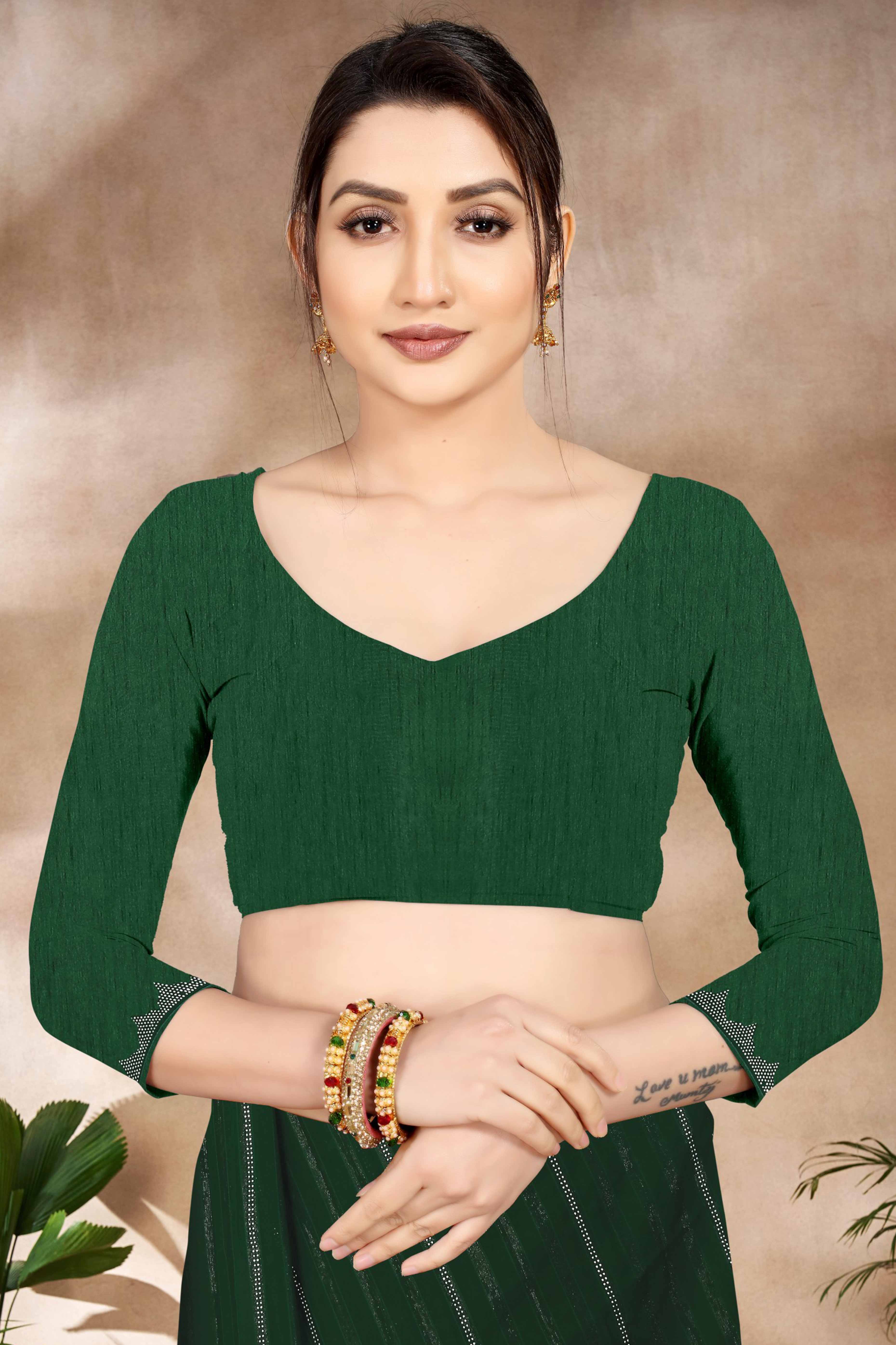 Green Chiffon Party Saree Featuring Delicate Stone Embellishments