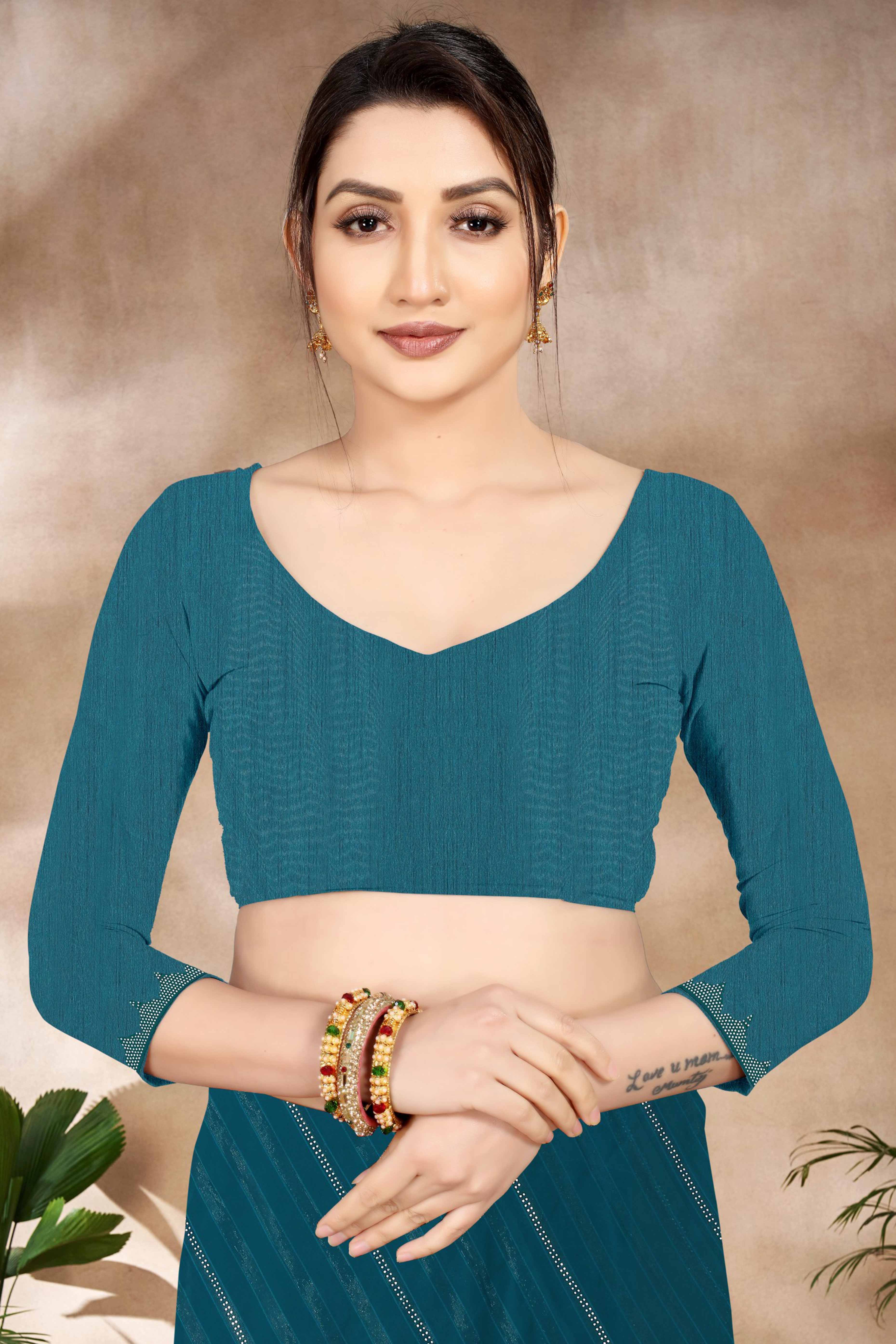 Teal Chiffon Party Saree Featuring Delicate Stone Embellishments