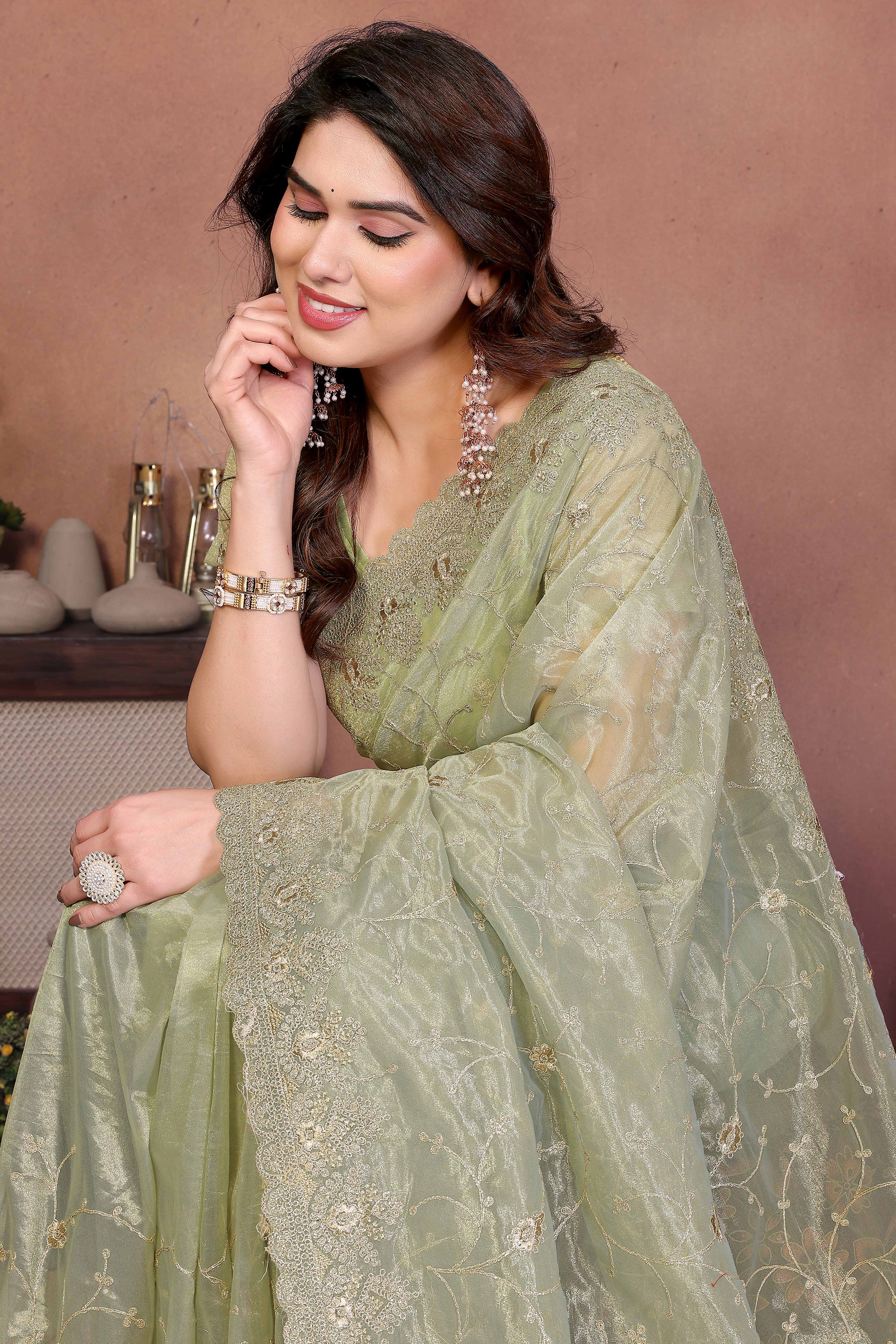 Pista Green Designer Twill Net Saree Enhanced with Delicate Thread Work Embroidery