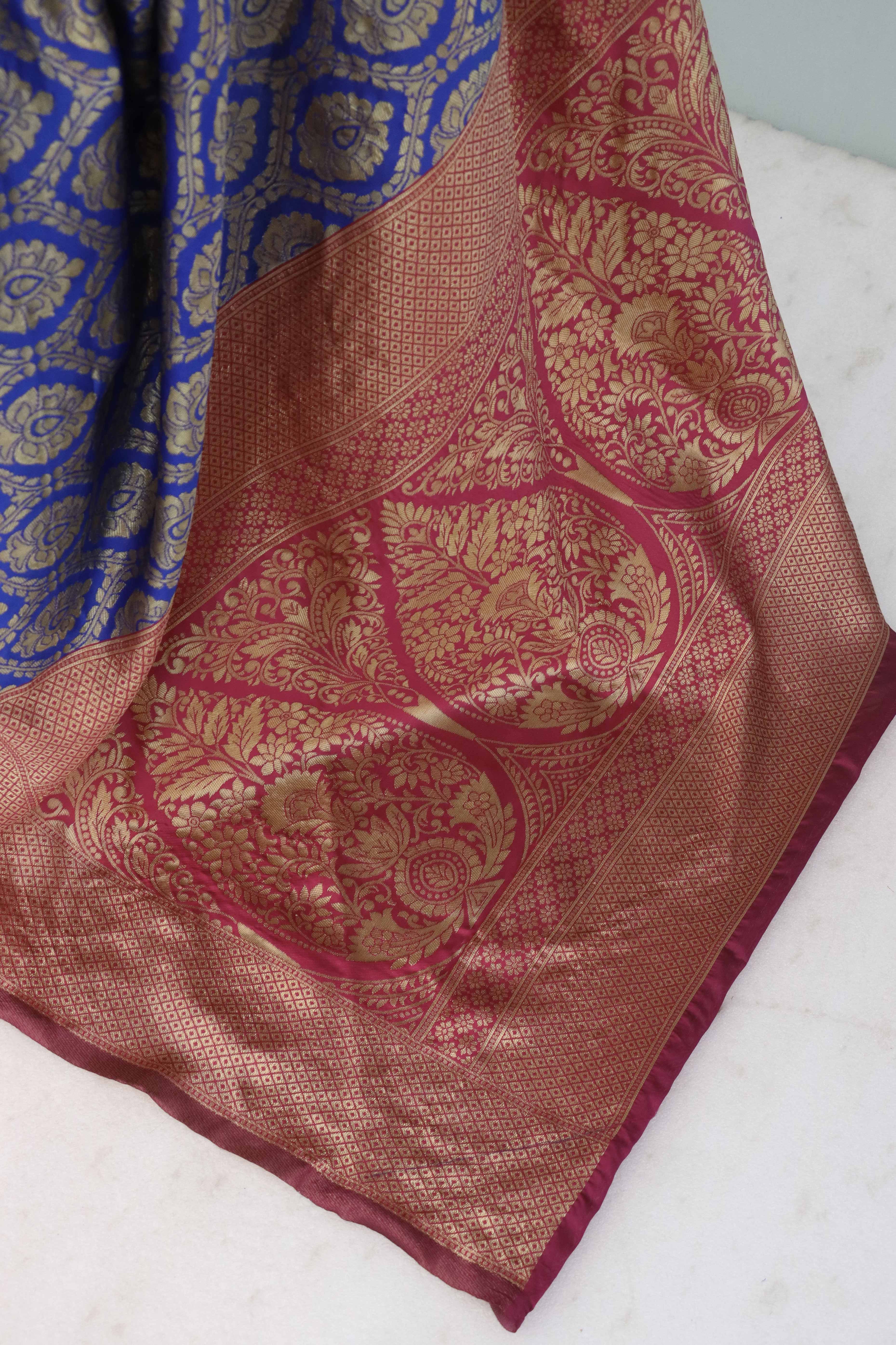 Charming Royal Blue & Pink Banarasi Silk Saree Adorned With Floral Zari Weaving