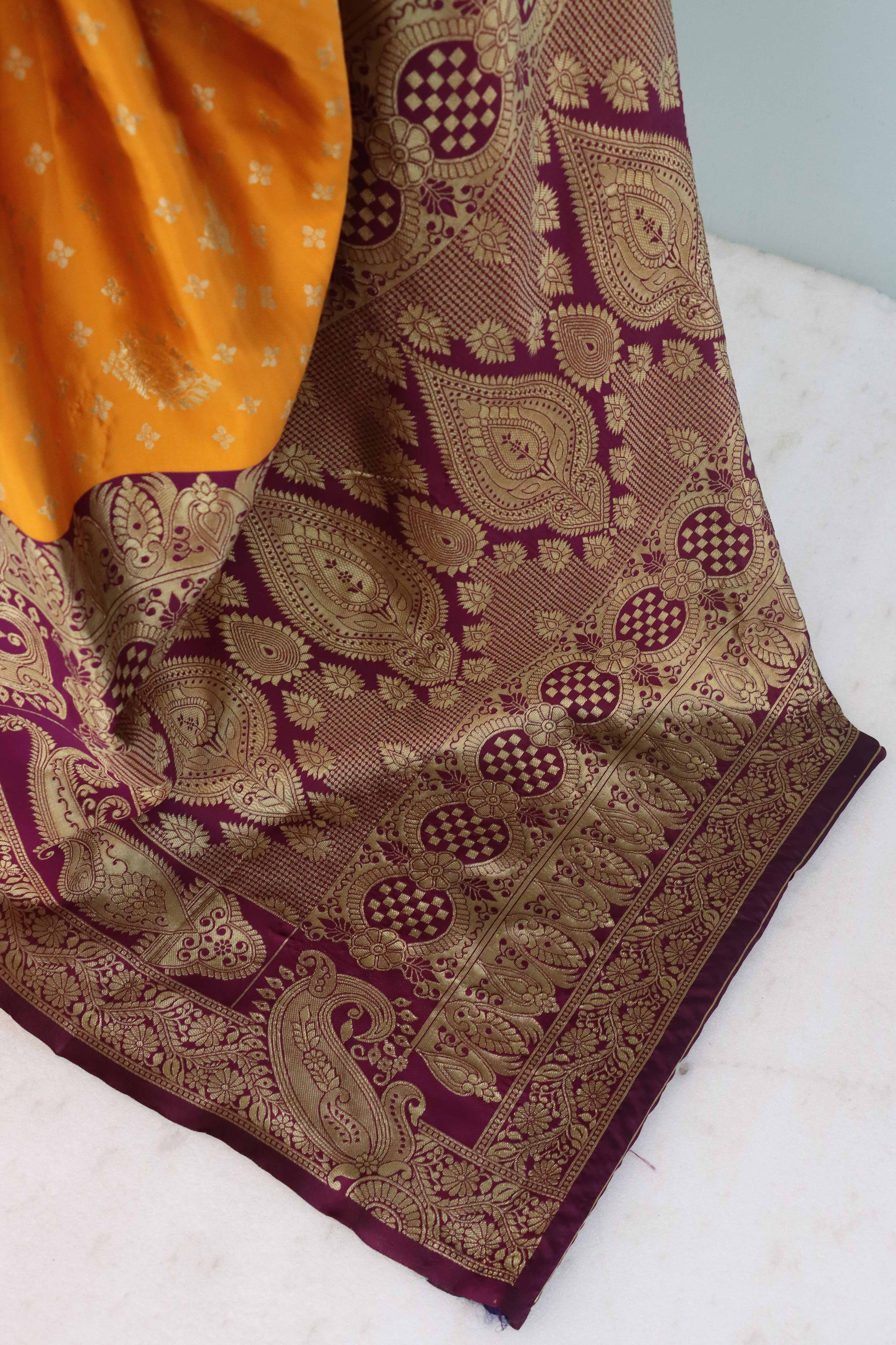 Classic Orange & Purple Silk Banarasi Saree Showcasing Delicate Floral Zari Weaving