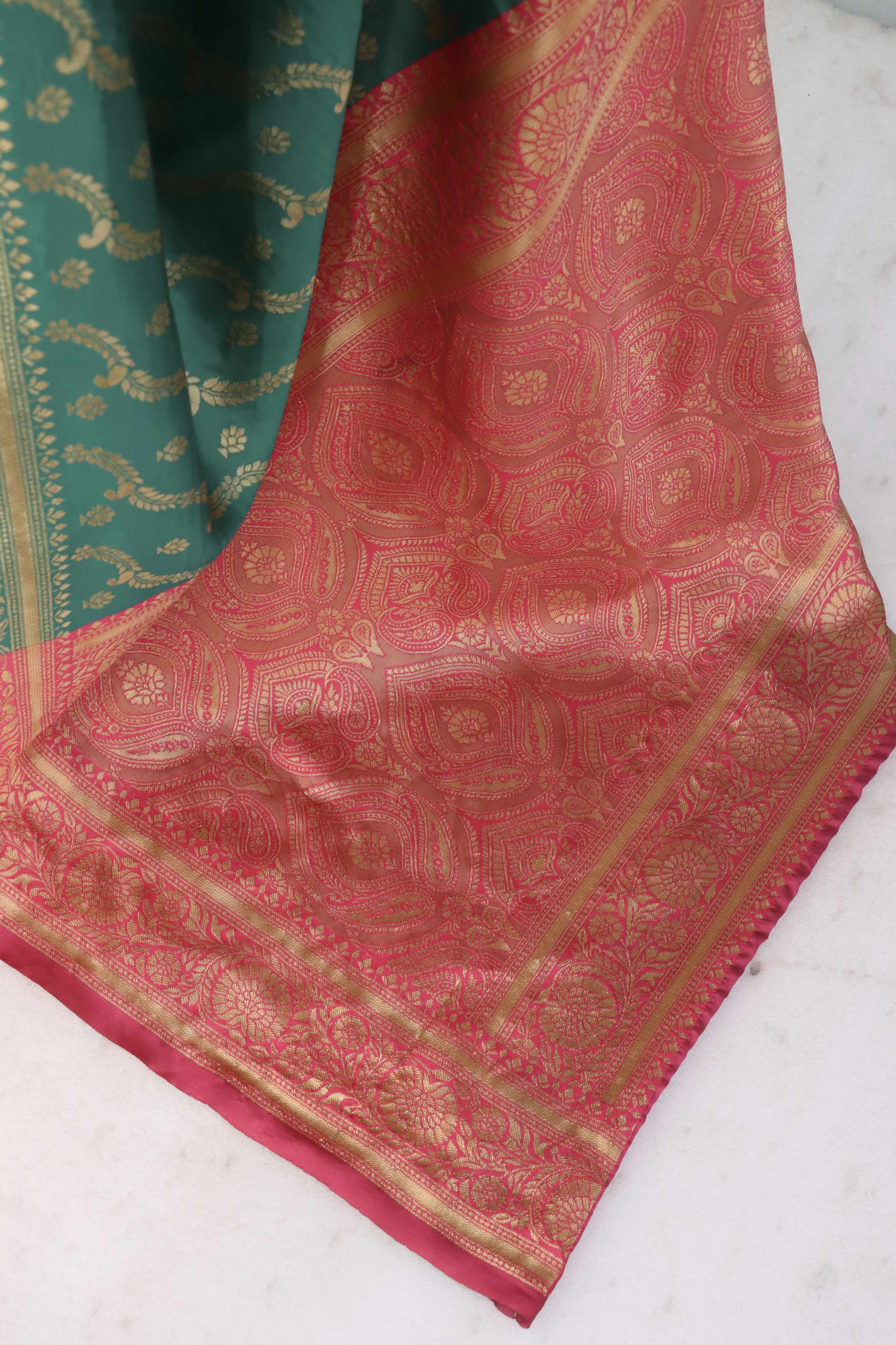 Graceful Rama Blue Banarasi Silk Saree Featuring Intricate Floral Zari Weaving Work