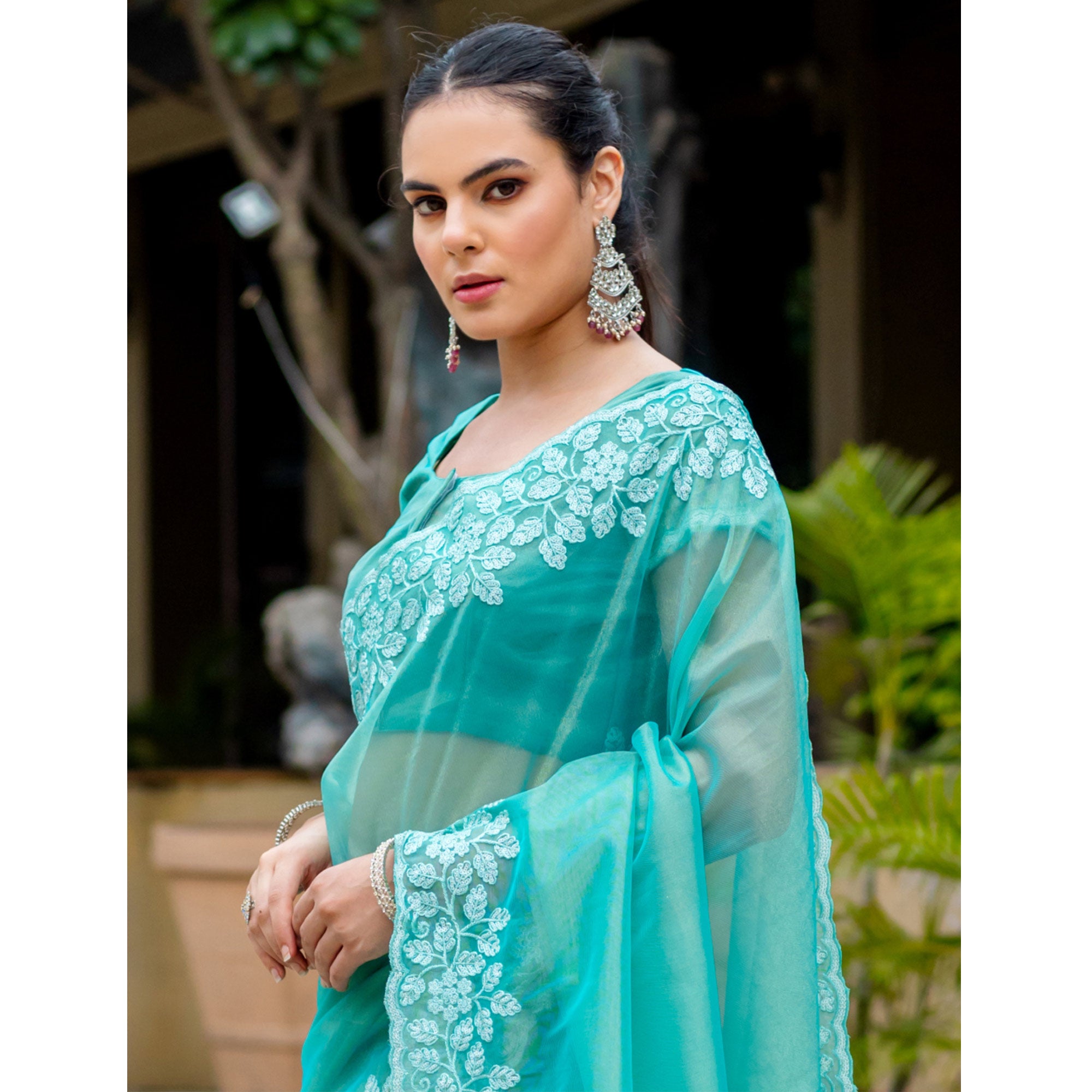 Turquoise Floral Sequins Embroidered Twill Net Saree