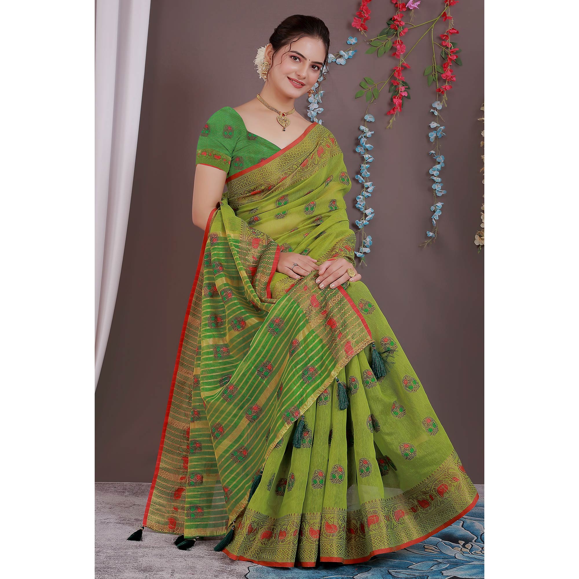 Green Floral Woven Cotton Silk Saree With Tassels