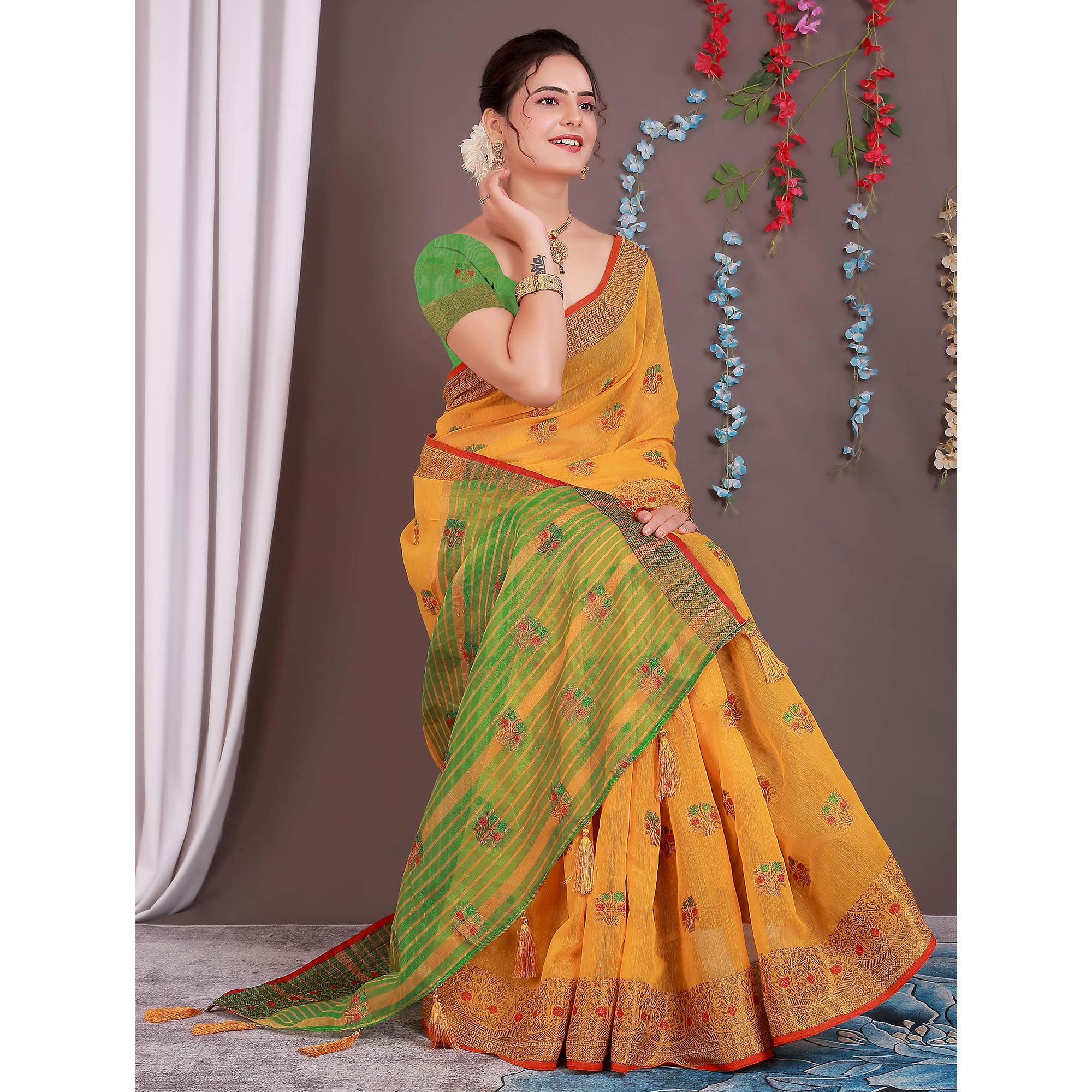Yellow Floral Woven Cotton Silk Saree With Tassels