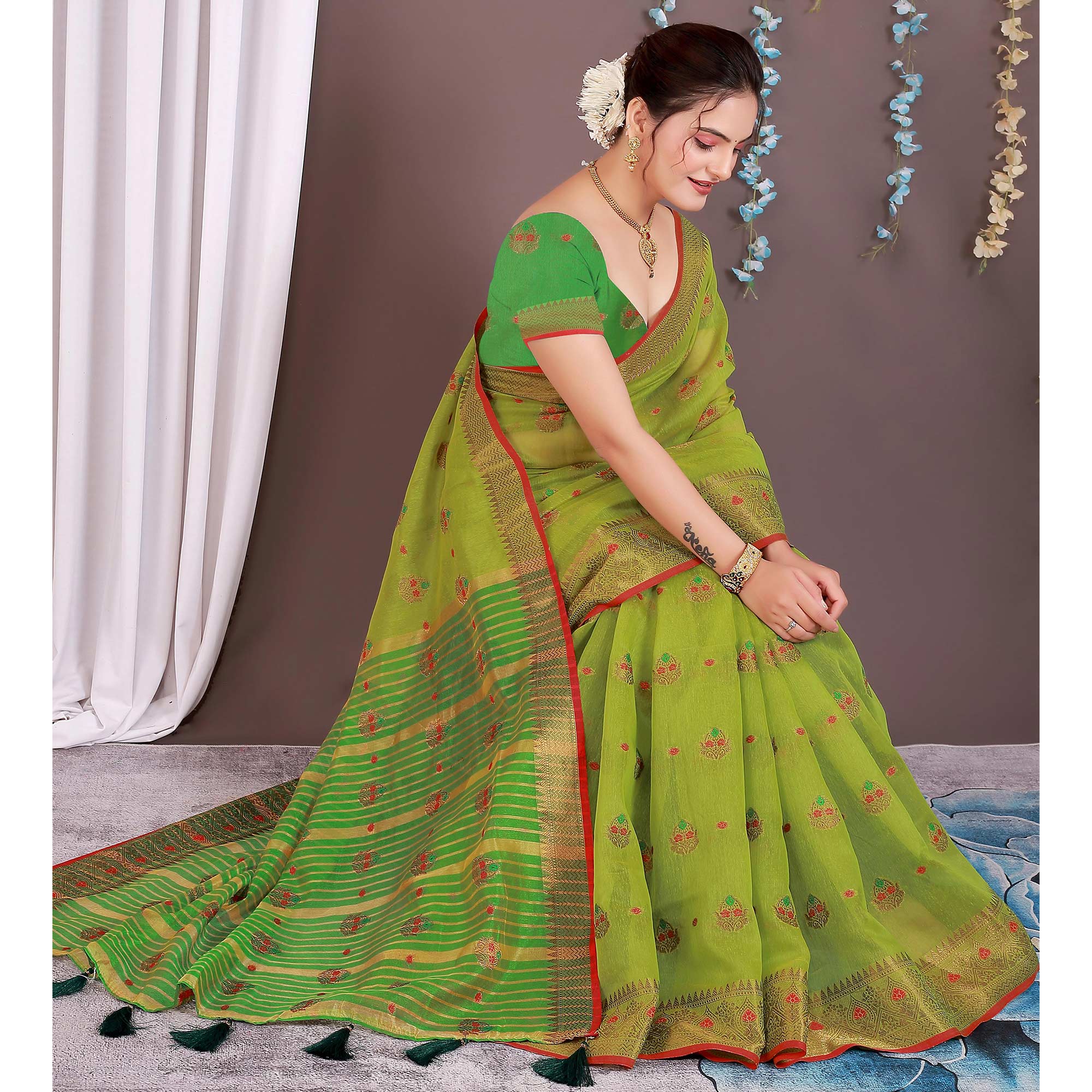 Green Floral Woven Cotton Silk Saree With Tassels
