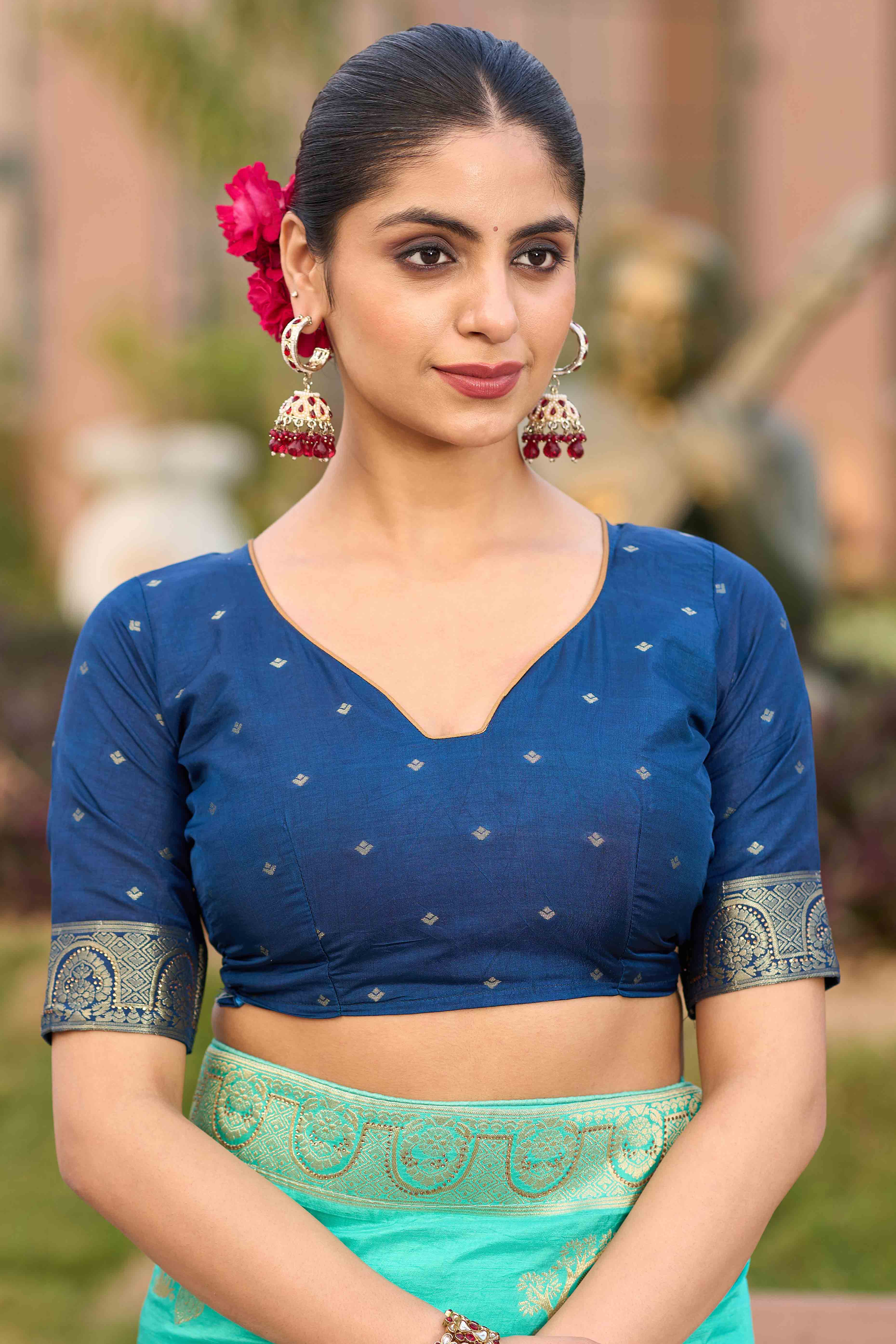 Radiant Turquoise Dola Silk Saree With Intricate Zari Weaving & Swarovski Accents