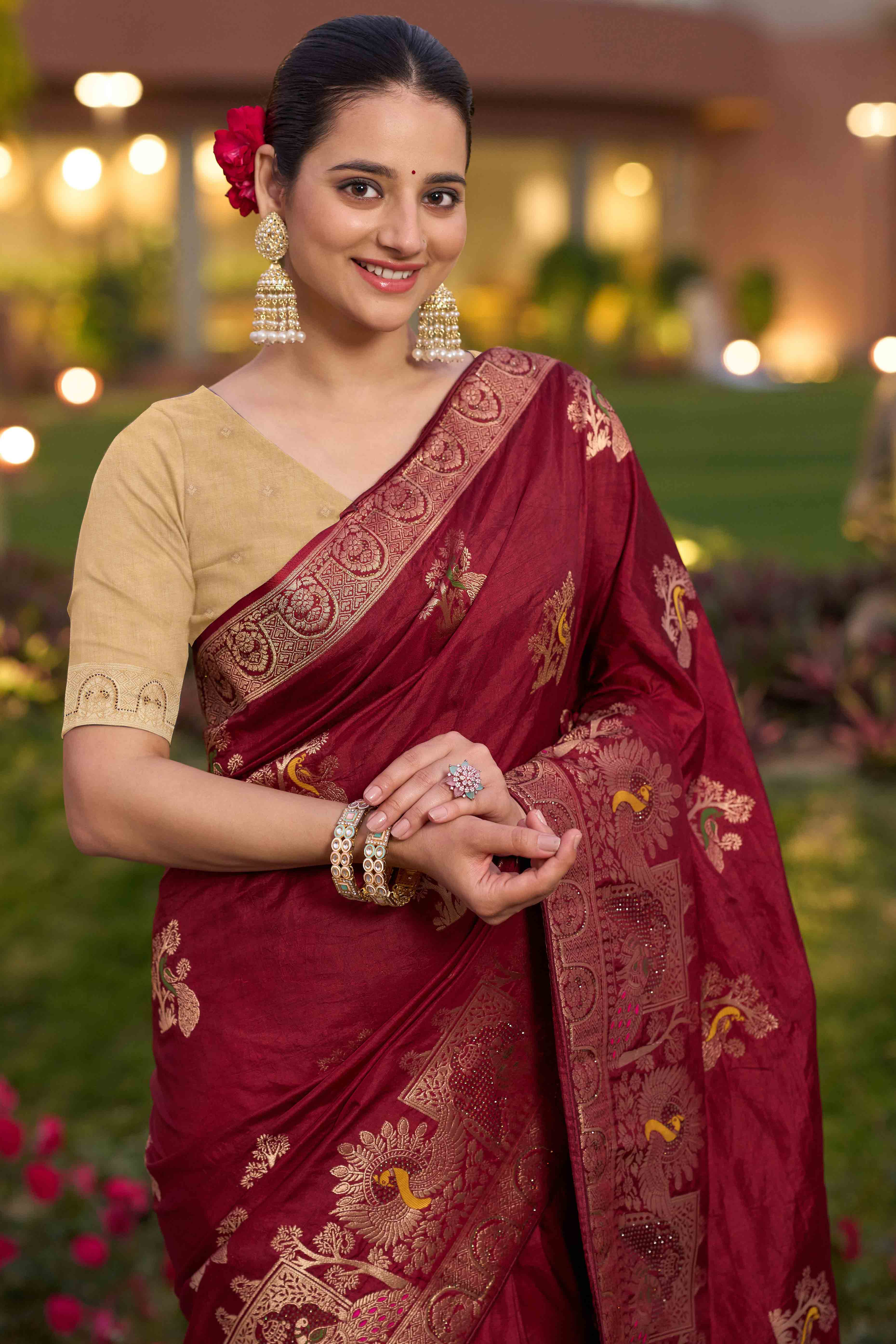Opulent Maroon Dola Silk Saree With Exquisite Zari Weaving & Swarovski Embellishments