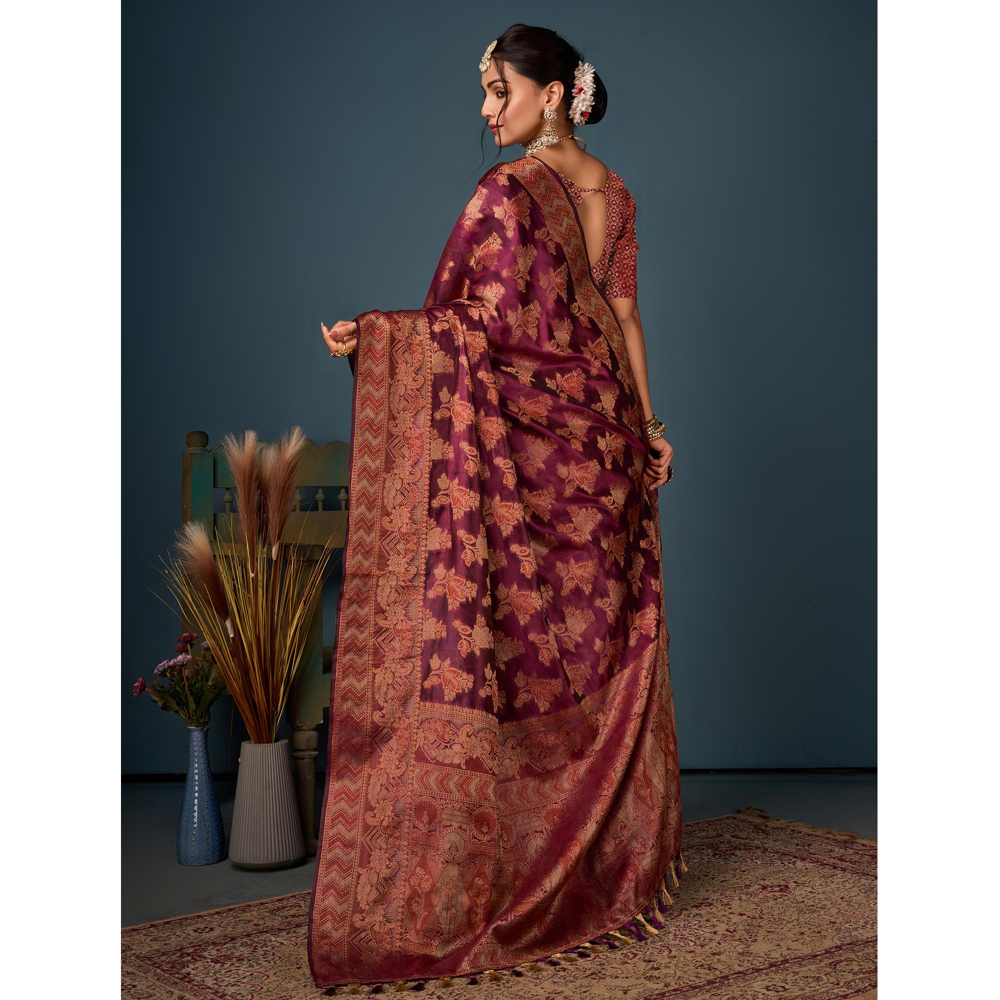 Wine Floral Woven Organza Saree With Tassels