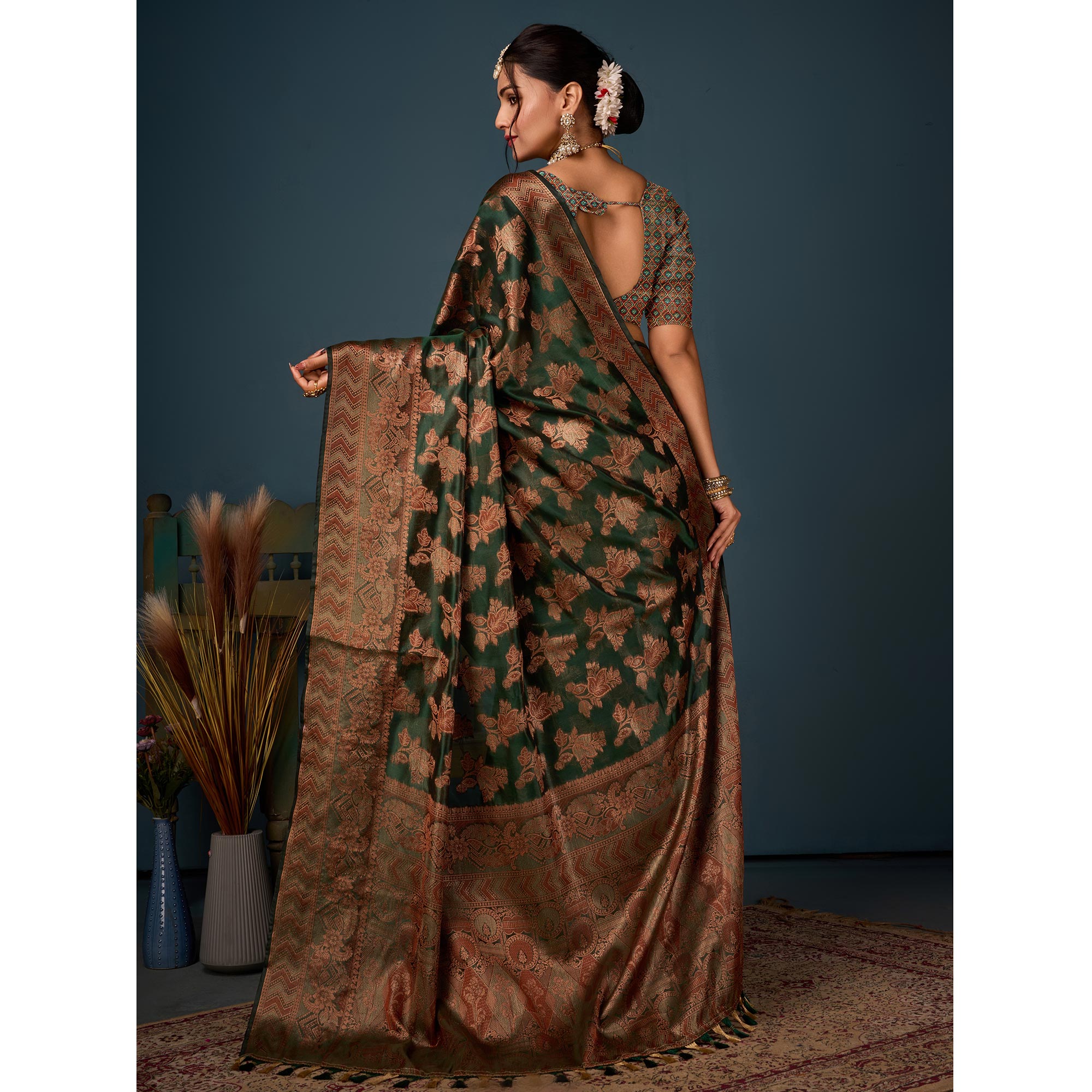 Bottle Green Floral Woven Organza Saree With Tassels