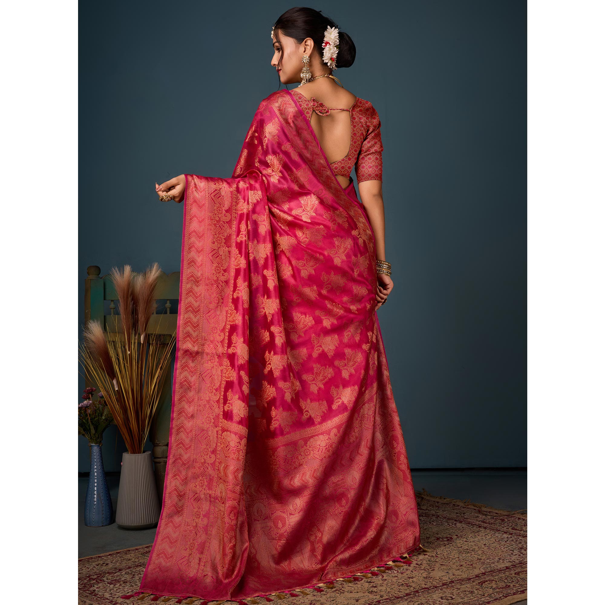 Rani Pink Floral Woven Organza Saree With Tassels